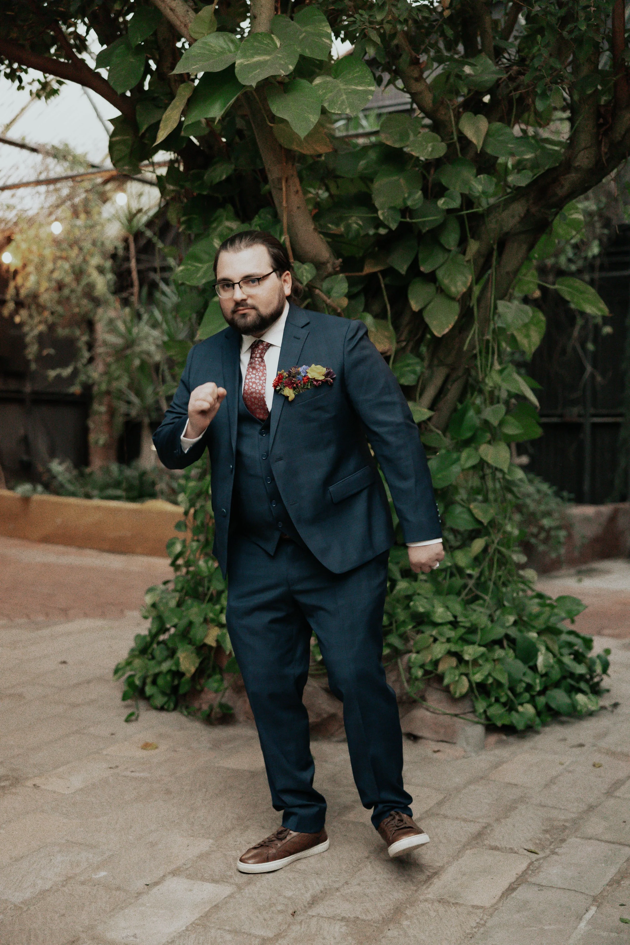 After the ceremony, Lauren and Joel explored the beautiful garden paths and adobe architecture of the Boojum Tree for their wedding portraits. Surrounded by desert greenery and warm Phoenix light, these moments captured the joy and excitement of thei