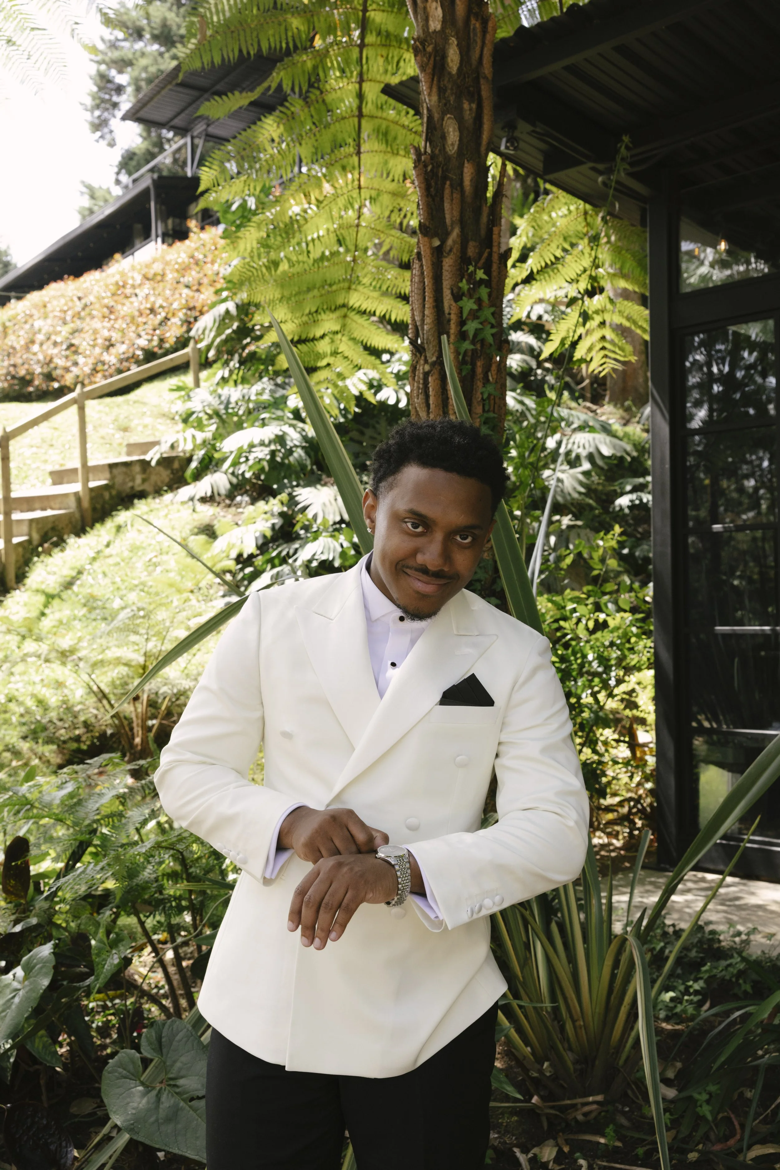 Destination wedding groom portraits at Forest Campestre in Medellín, Colombia featuring modern wedding attire, groomsmen portraits, formal wedding party photos, and documentary wedding photography