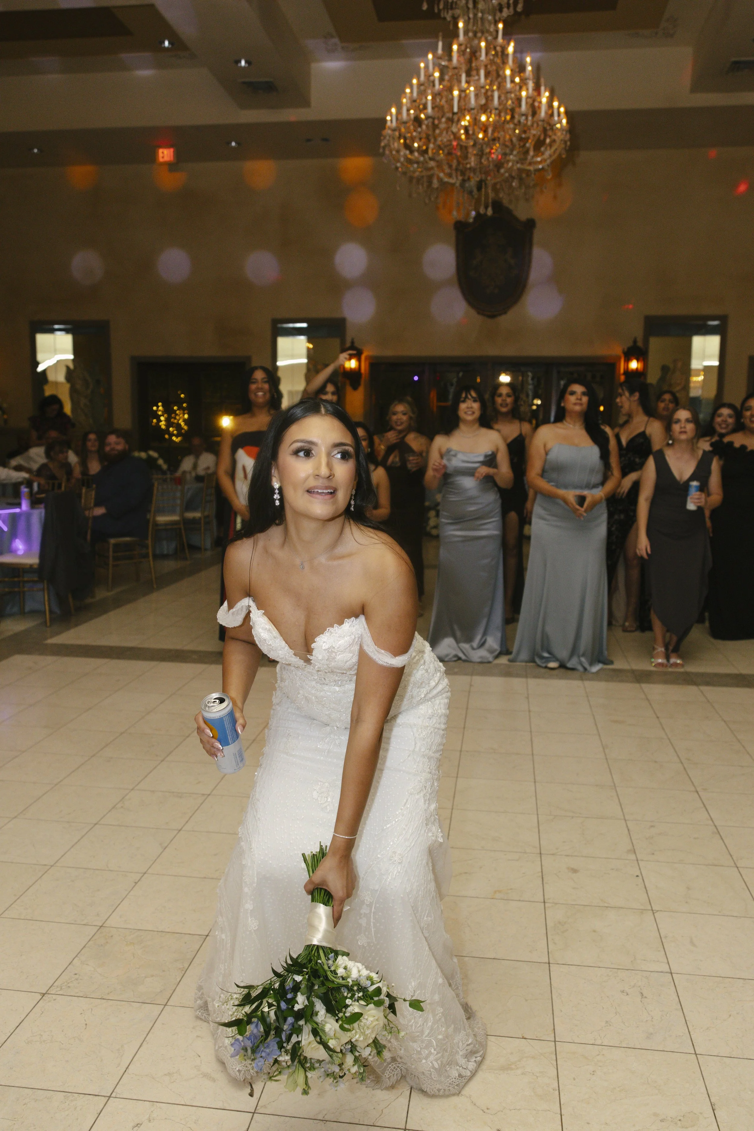 The reception celebration at Ashley Castle in Chandler, Arizona, came to life through hybrid film and digital photography, capturing elegant reception details, joyful bridal party entrances, and lively dance floor moments inside the castle’s grand ba