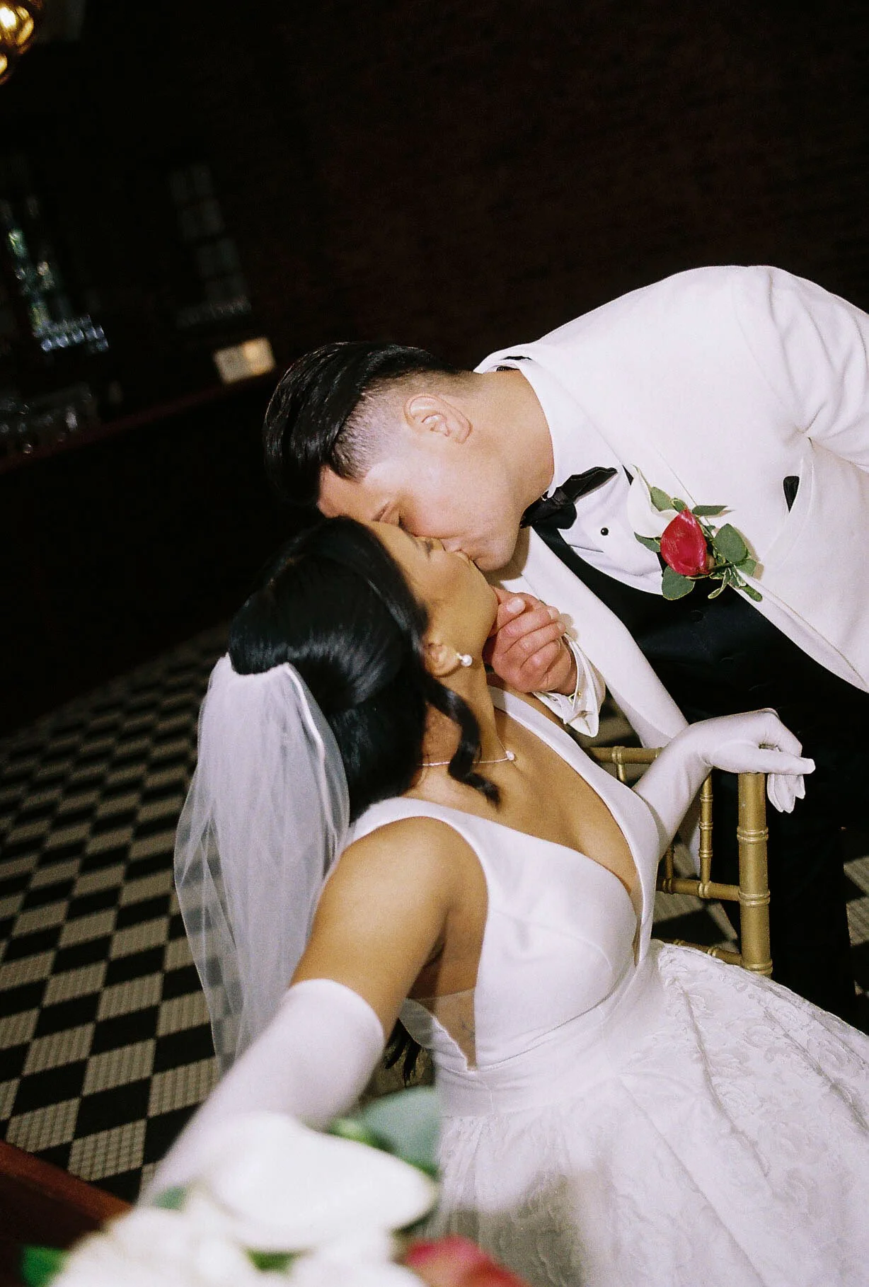 Bride and groom portraits at Hotel DuVillage showcase the venue's picturesque gardens, waterfront views, and timeless charm. Photographed on both digital and 35mm film, these wedding portraits focus on authentic connection, natural movement, and cand