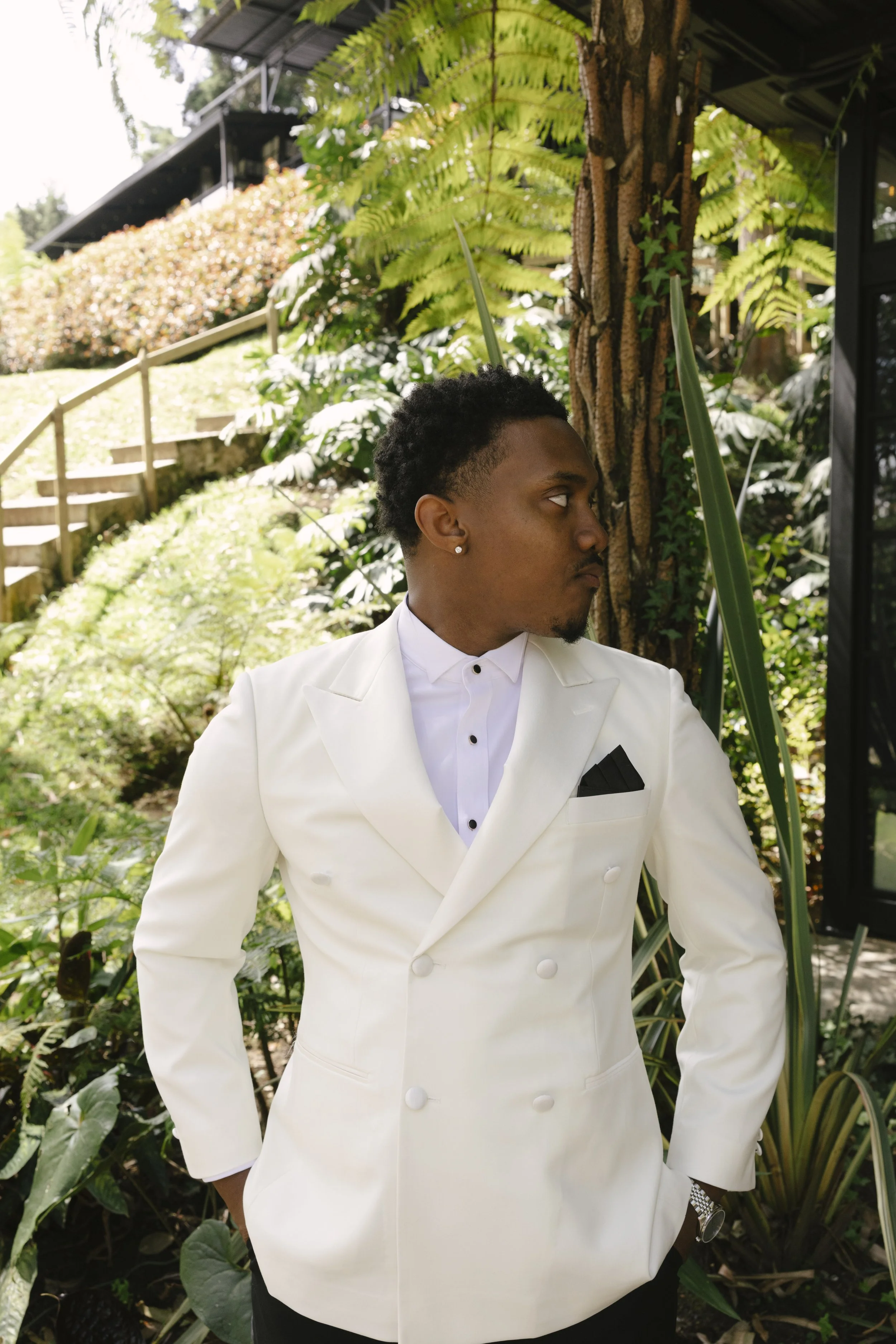 Destination wedding groom portraits at Forest Campestre in Medellín, Colombia featuring modern wedding attire, groomsmen portraits, formal wedding party photos, and documentary wedding photography