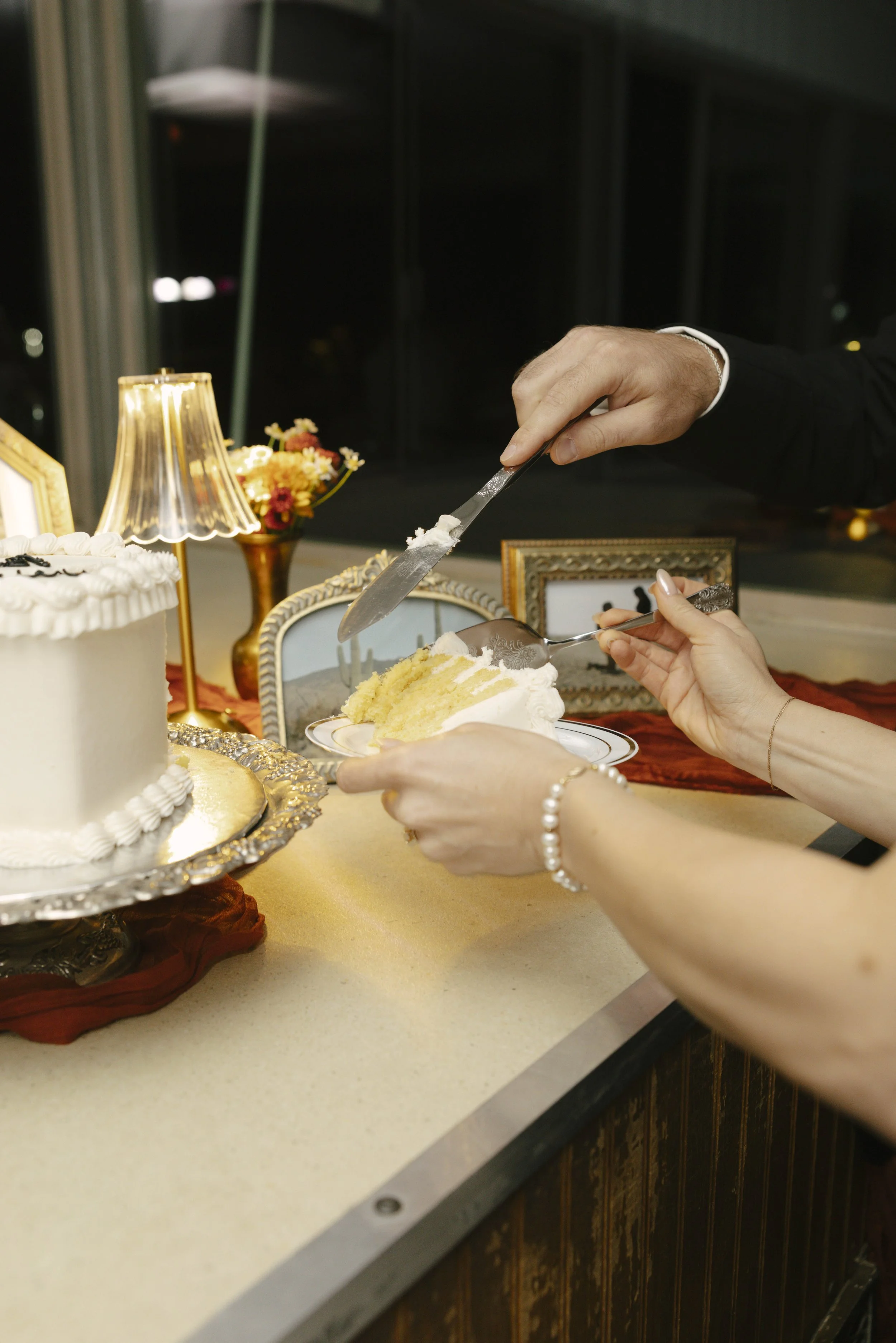 To close out the evening aboard the Dolly Steamboat, the couple shared their cake cutting surrounded by family and friends. It was a sweet and joyful moment that wrapped up their Canyon Lake wedding celebration with laughter, love, and one last toast