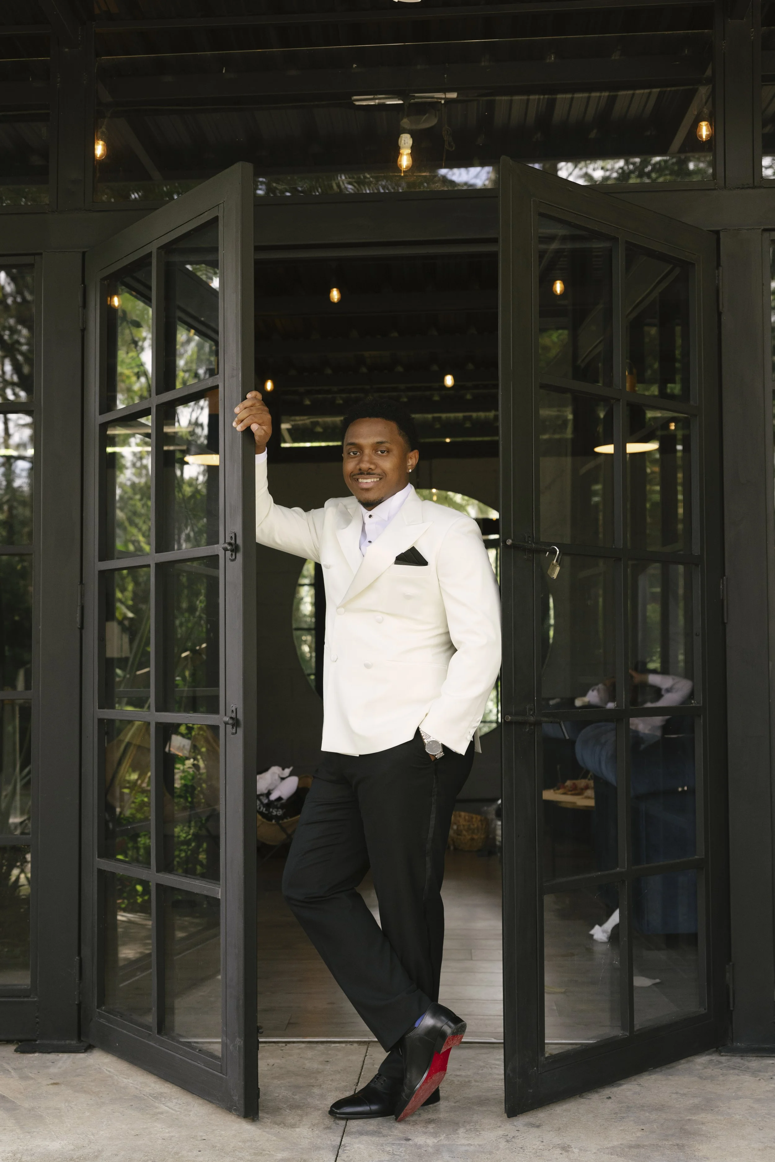 Destination wedding groom portraits at Forest Campestre in Medellín, Colombia featuring modern wedding attire, groomsmen portraits, formal wedding party photos, and documentary wedding photography