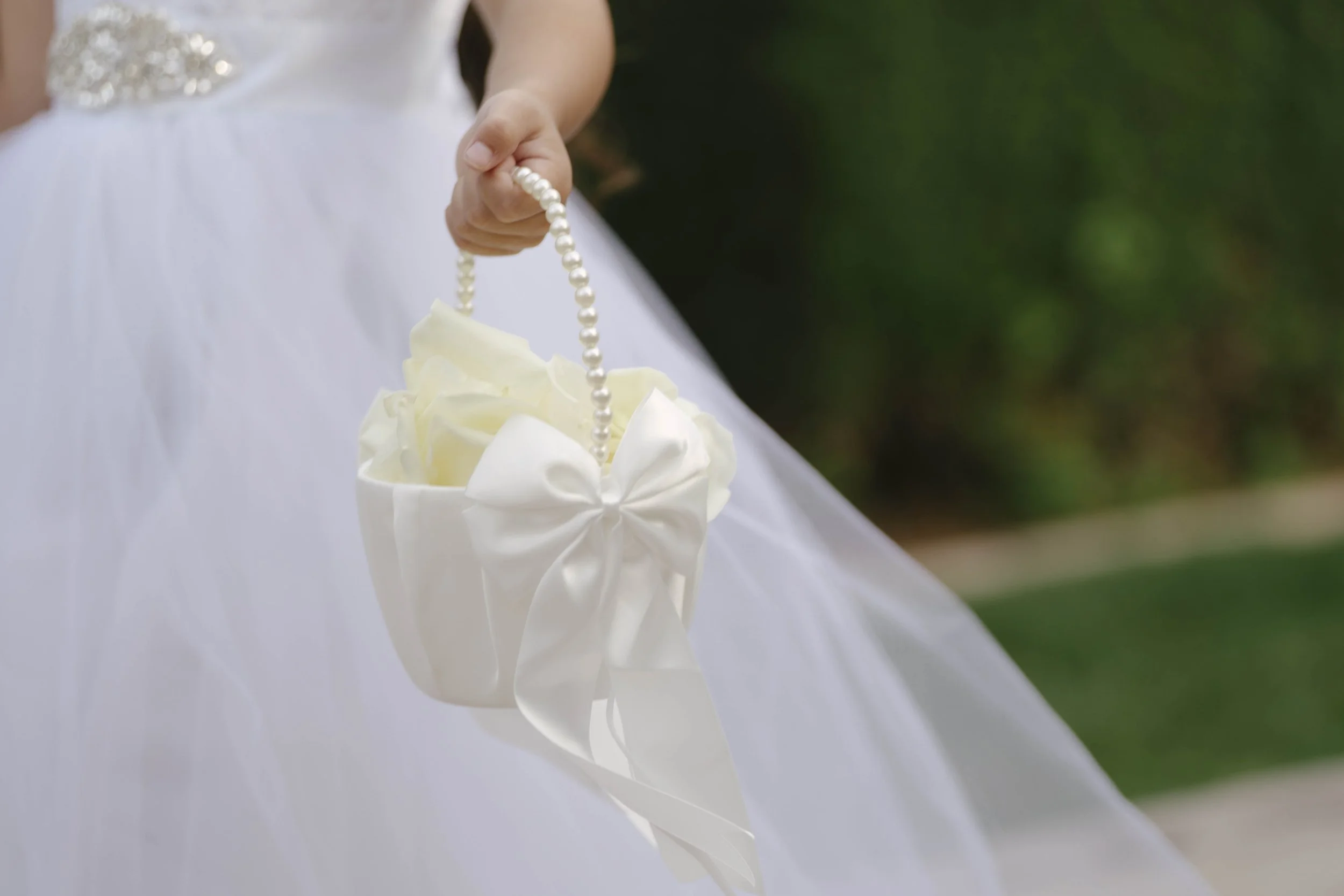 The wedding processional at Ashley Castle in Chandler, Arizona, was captured through hybrid film and digital photography, preserving the graceful entrances of the bridal party as they made their way through the romantic outdoor ceremony space surroun