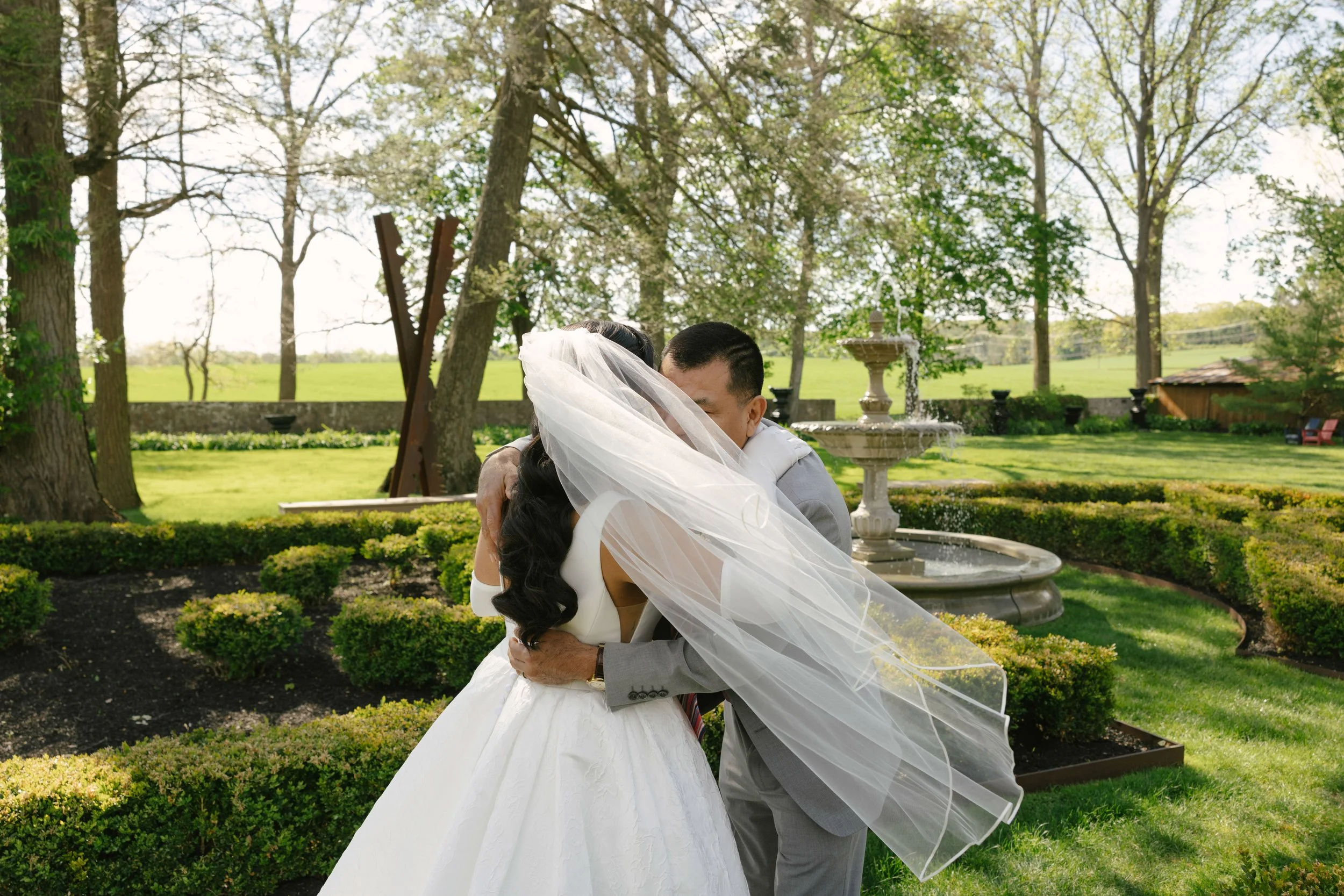A heartfelt first look between the bride and her father, followed by an emotional first look between the bride and groom at Hotel DuVillage. Captured on both digital and 35mm film, these quiet moments before the ceremony reflect the anticipation, emo