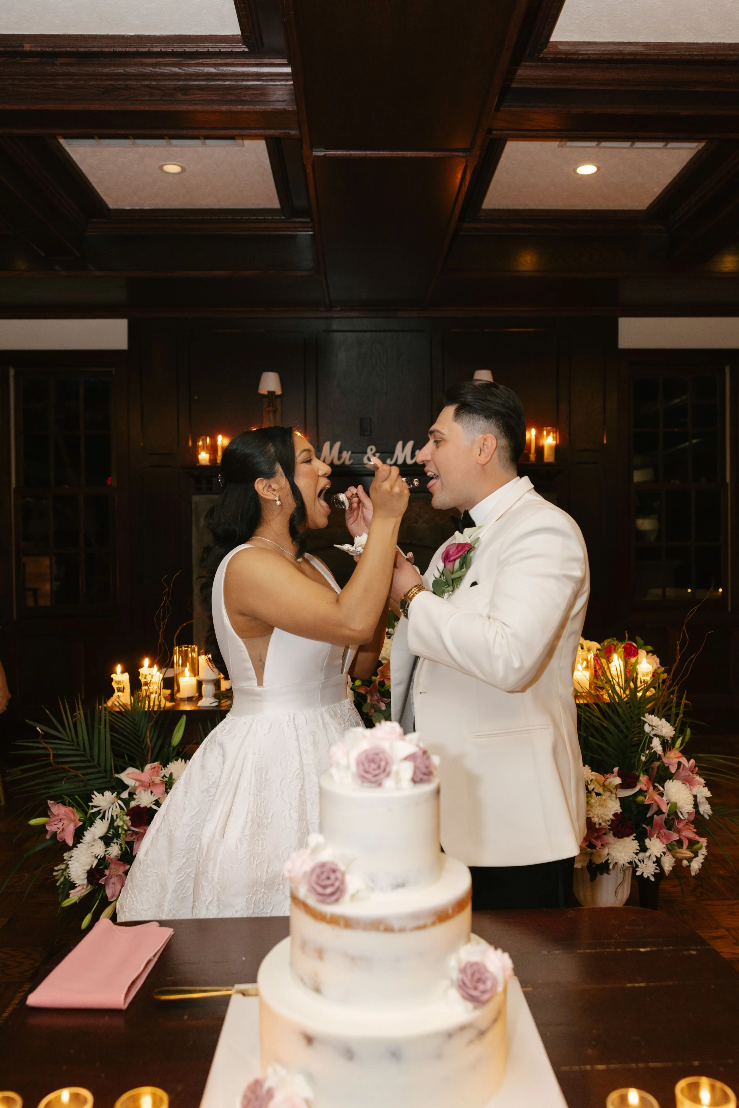 The bride and groom celebrated another unforgettable milestone by cutting their wedding cake together at Hotel DuVillage. Captured on both digital and 35mm film, these sweet moments were filled with laughter, celebration, and the joy of sharing one o