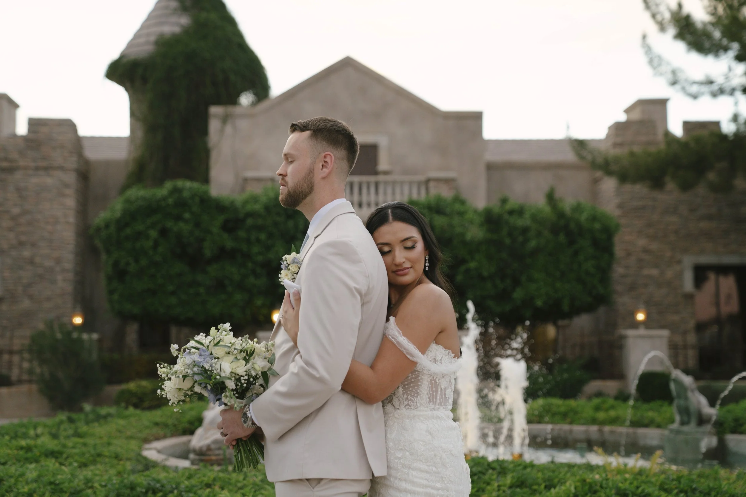 Intimate bride and groom portraits at Ashley Castle in Chandler, Arizona, were captured through hybrid film and digital photography, preserving romantic close-up moments filled with emotion, tenderness, and timeless newlywed connection.