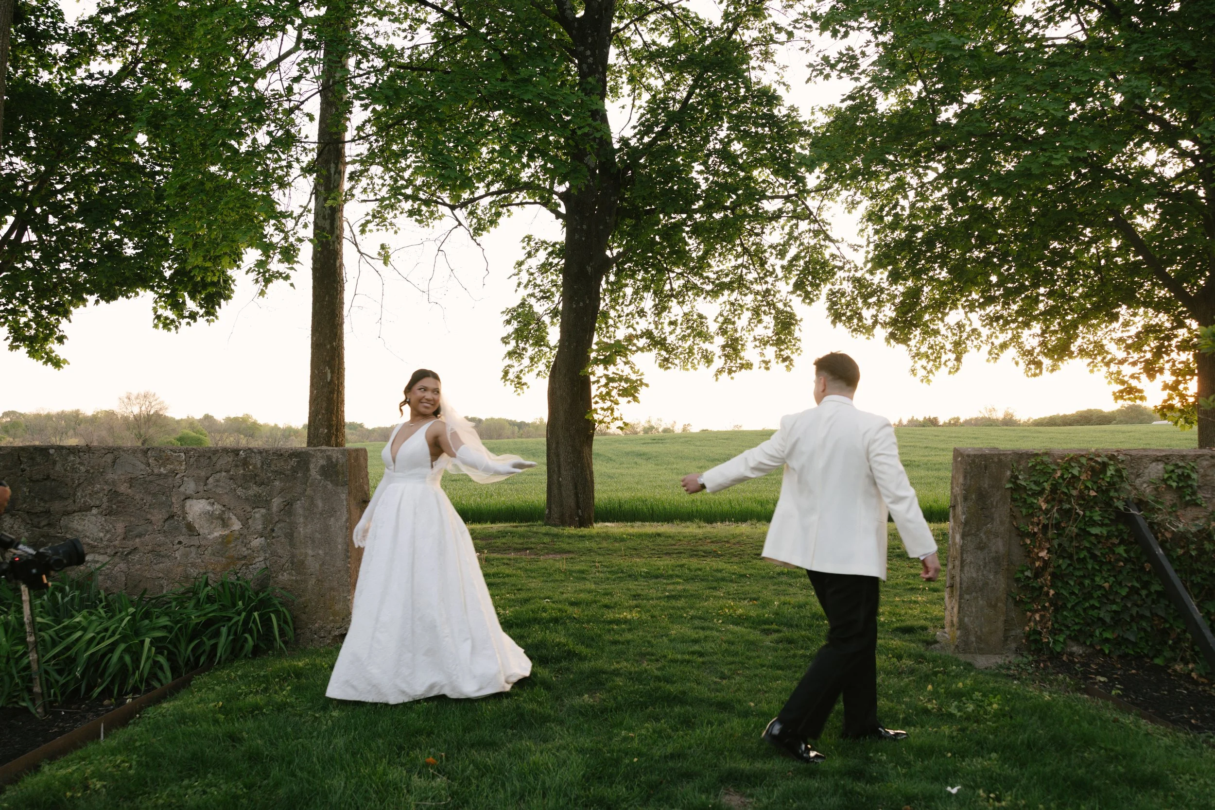 As the sun began to set, the bride and groom stepped away for golden hour portraits around the grounds of Hotel DuVillage. Captured on both digital and 35mm film, these sunset portraits highlight the warmth, romance, and quiet moments shared between 