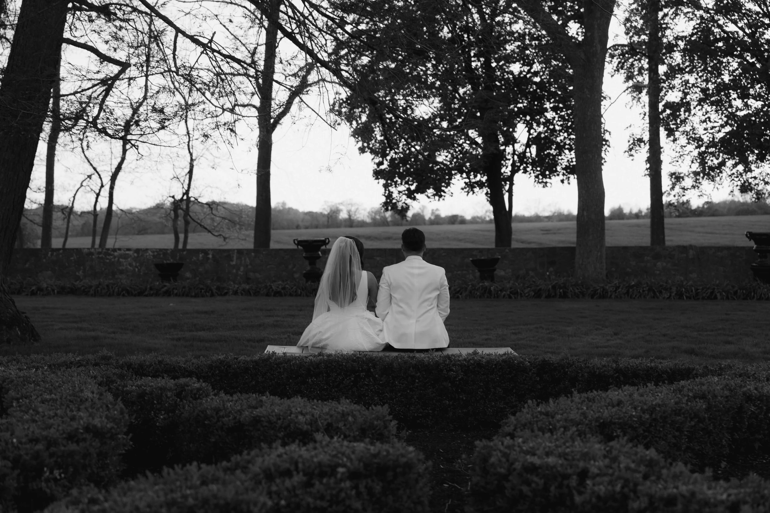 As the sun began to set, the bride and groom stepped away for golden hour portraits around the grounds of Hotel DuVillage. Captured on both digital and 35mm film, these sunset portraits highlight the warmth, romance, and quiet moments shared between 