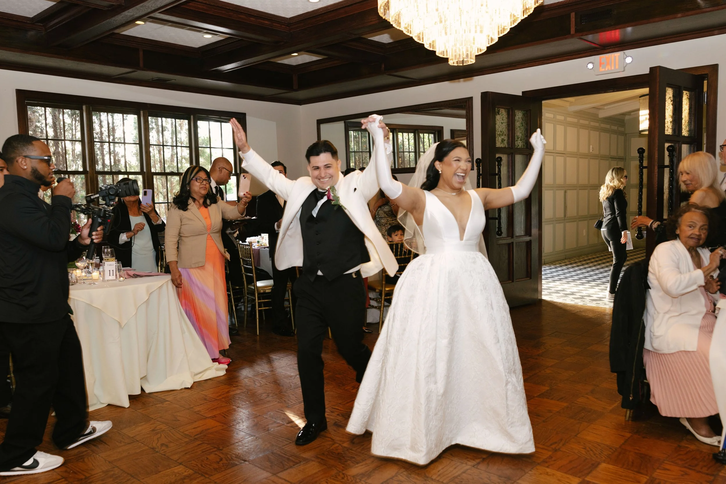 The reception at Hotel DuVillage kicked off with an unforgettable grand entrance as the bride, groom, and their loved ones filled the room with energy and excitement. From the first dance to the celebration that followed, every moment was captured on