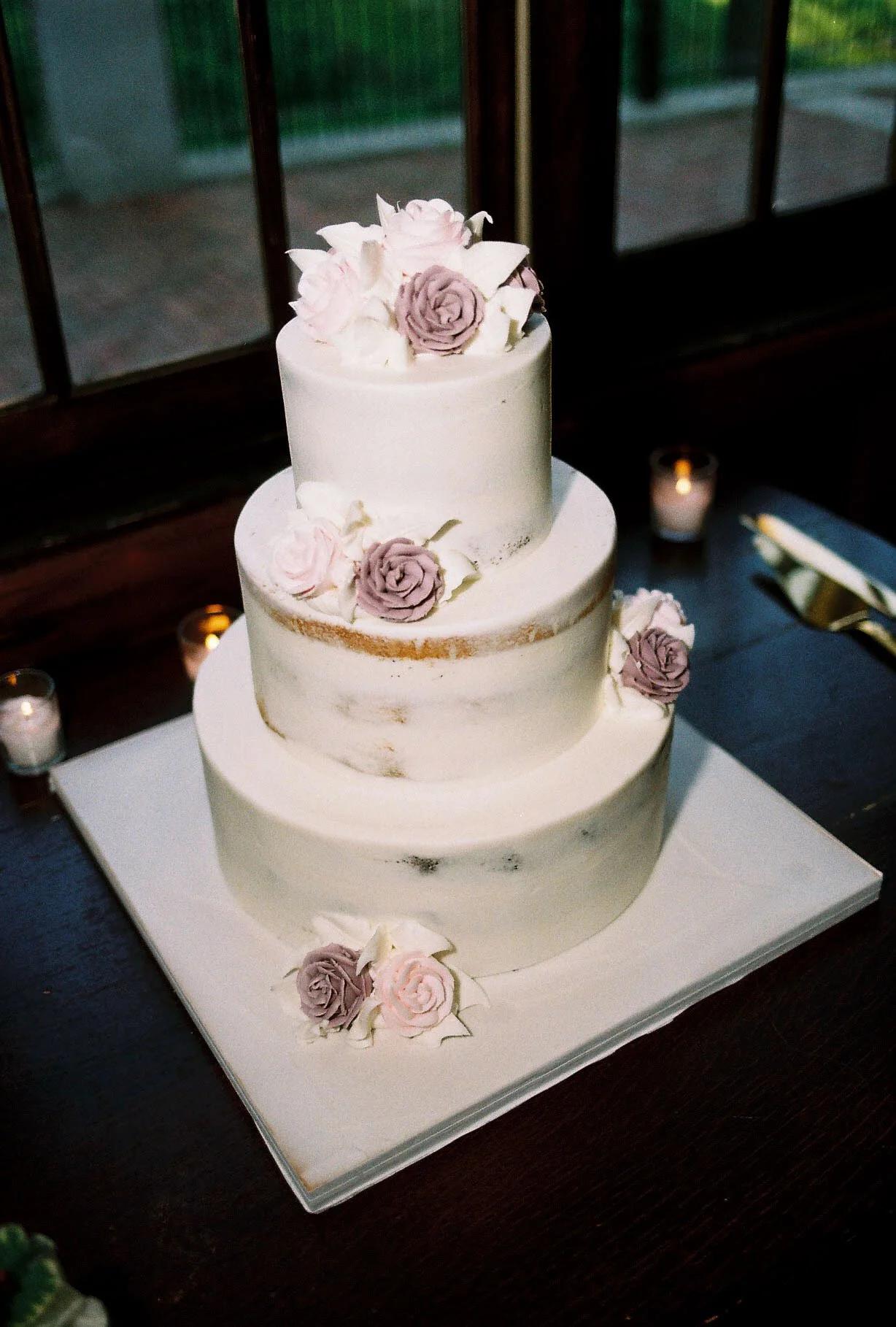 Thoughtfully curated wedding details at Hotel DuVillage, from the elegant reception décor and floral design to the custom stationery, wedding cake, and meaningful personal touches. Captured on both digital and 35mm film, every detail tells a part of 