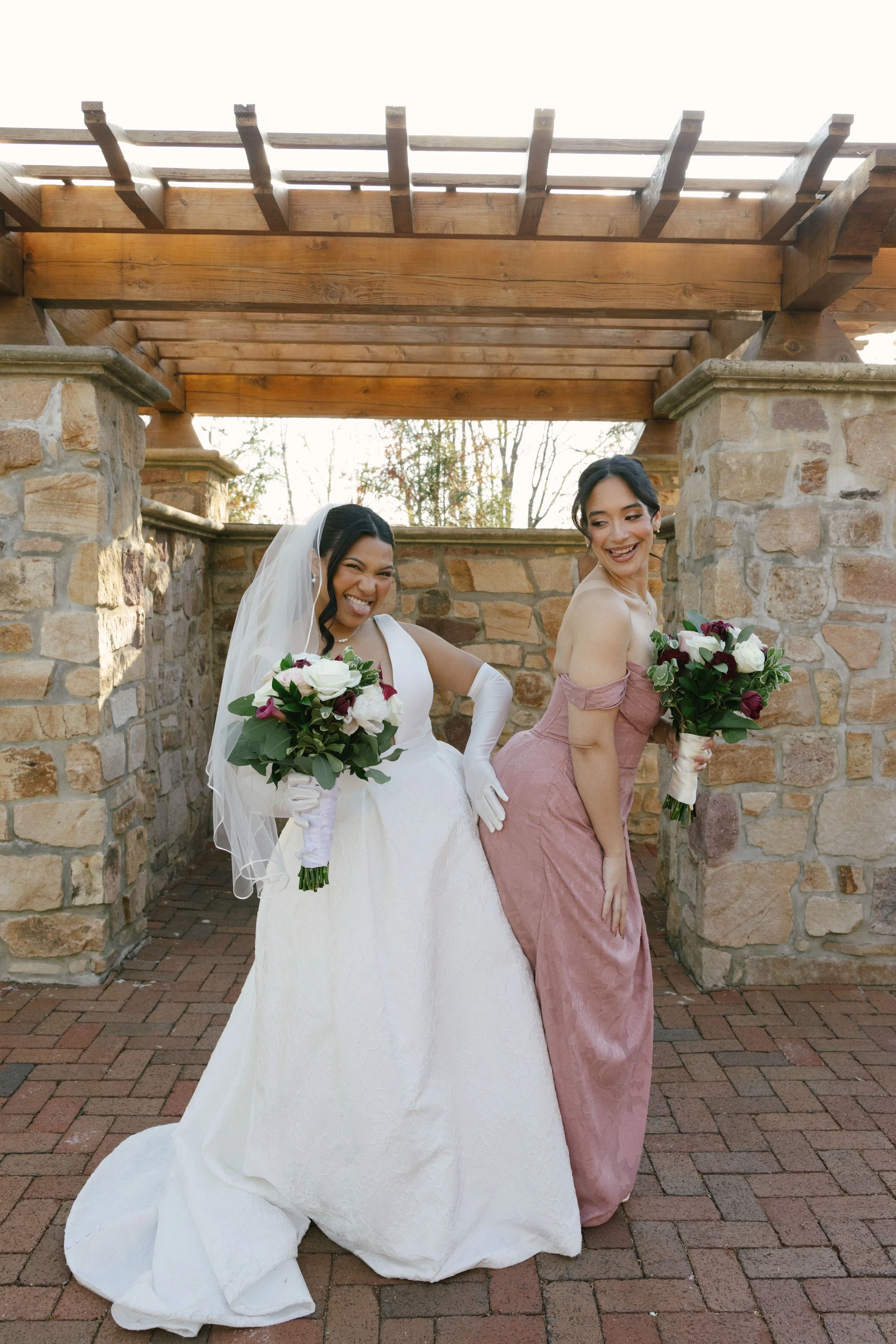 Bridal party portraits at Hotel DuVillage celebrate the bride and groom alongside their closest friends and family. Captured on digital and 35mm film, these images highlight genuine laughter, timeless portraits, and unforgettable moments.