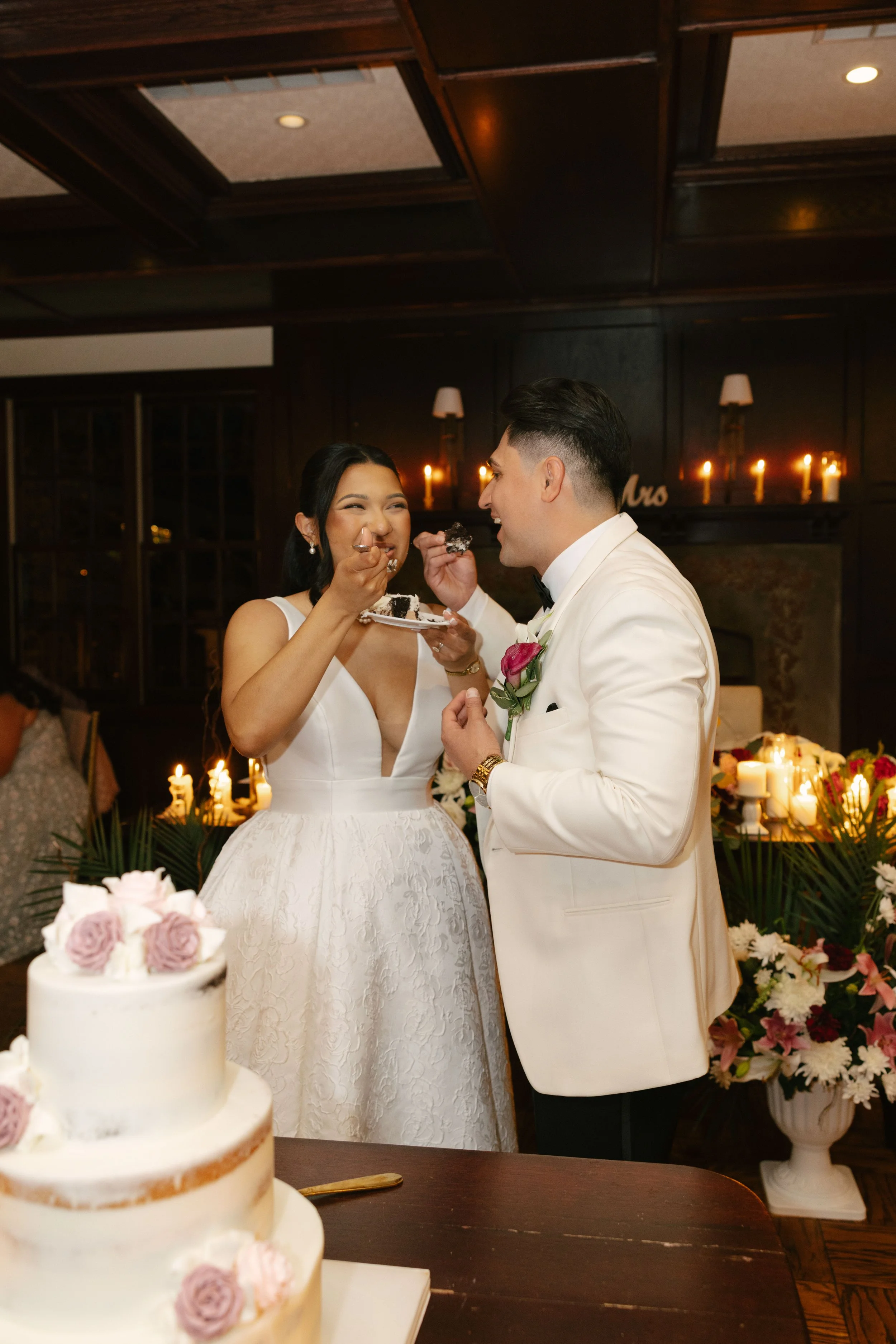 The bride and groom celebrated another unforgettable milestone by cutting their wedding cake together at Hotel DuVillage. Captured on both digital and 35mm film, these sweet moments were filled with laughter, celebration, and the joy of sharing one o