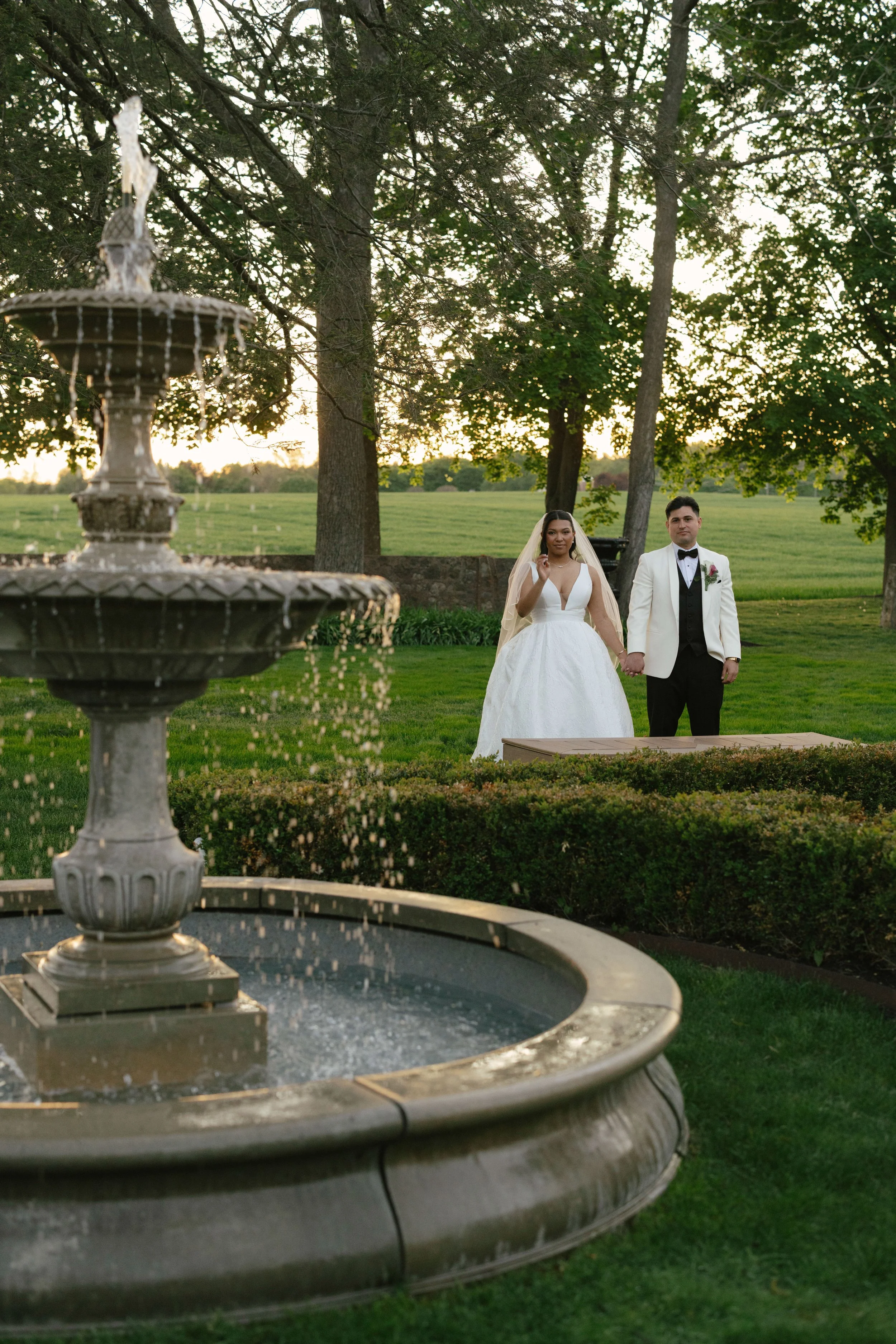 As the sun began to set, the bride and groom stepped away for golden hour portraits around the grounds of Hotel DuVillage. Captured on both digital and 35mm film, these sunset portraits highlight the warmth, romance, and quiet moments shared between 