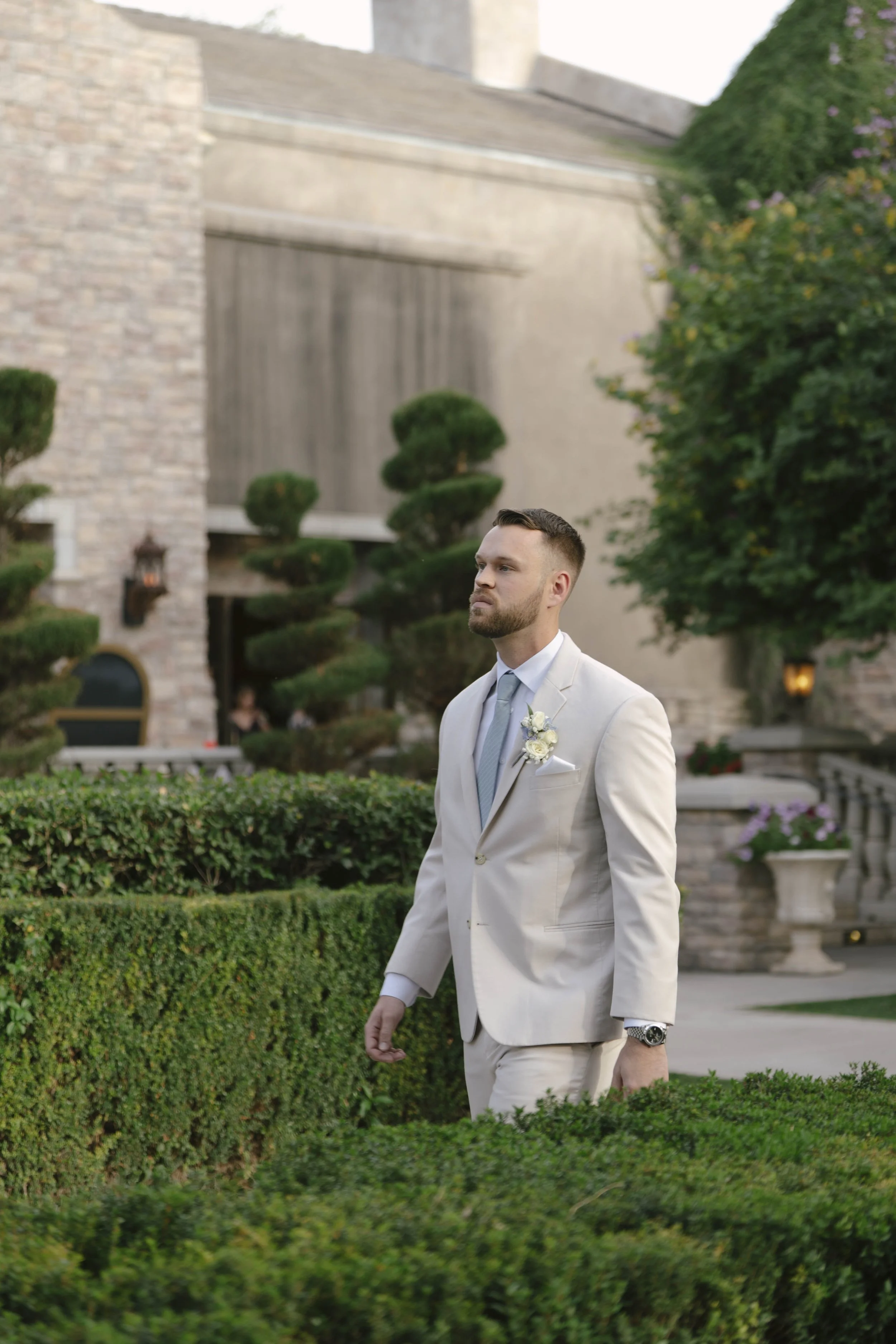 Ceremony details at Ashley Castle in Chandler, Arizona, were thoughtfully captured through hybrid film and digital photography, highlighting elegant signage, romantic seating displays, and the bridesmaid processional as guests gathered for this timel