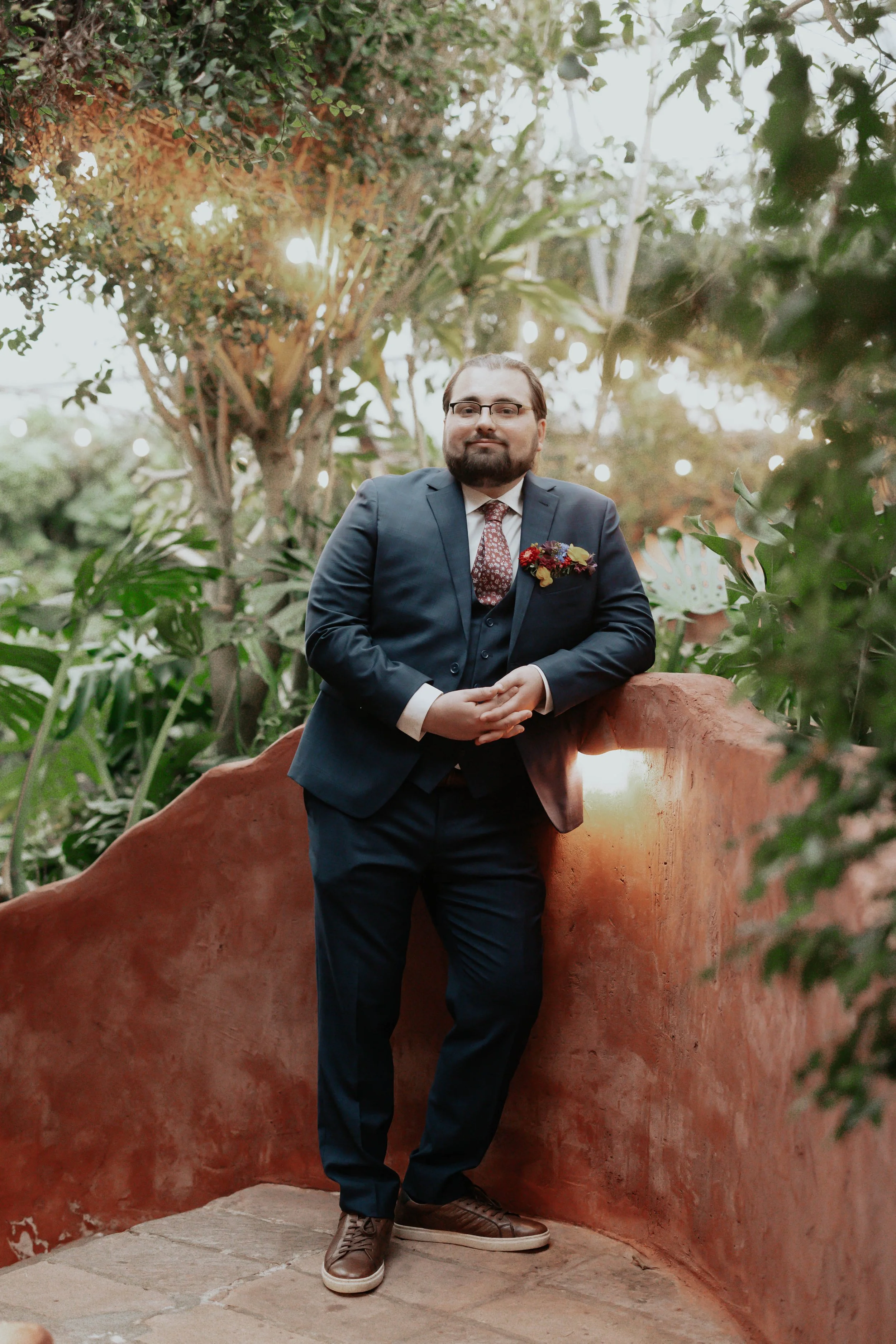 After the ceremony, Lauren and Joel explored the beautiful garden paths and adobe architecture of the Boojum Tree for their wedding portraits. Surrounded by desert greenery and warm Phoenix light, these moments captured the joy and excitement of thei