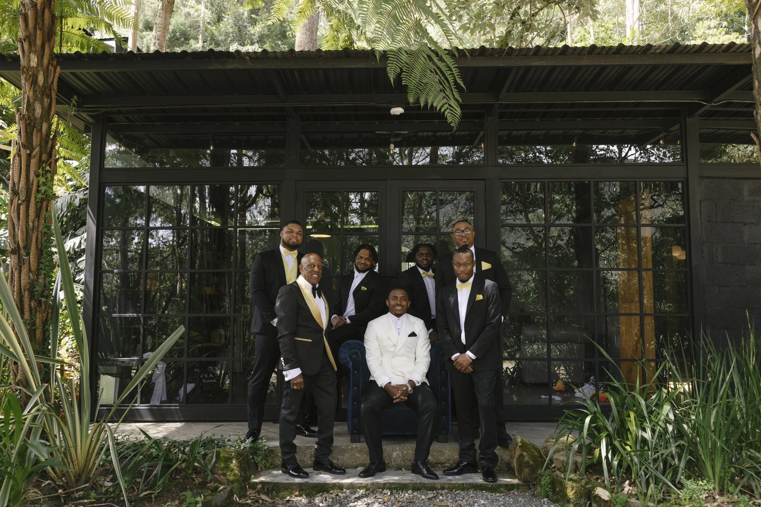 Destination wedding groom portraits at Forest Campestre in Medellín, Colombia featuring modern wedding attire, groomsmen portraits, formal wedding party photos, and documentary wedding photography