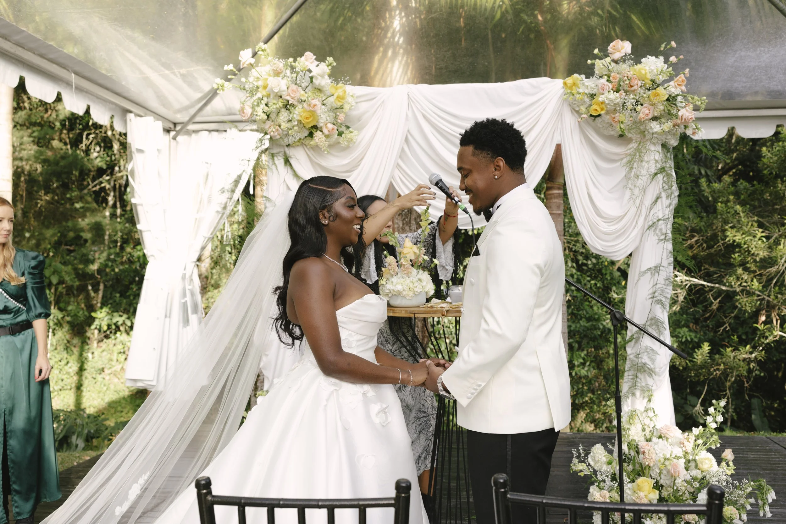 Forest Campestre wedding ceremony in Medellín, Colombia featuring the bridal processional, groom's reaction, emotional ceremony moments, floral aisle design, wedding guests, and documentary-style wedding photography