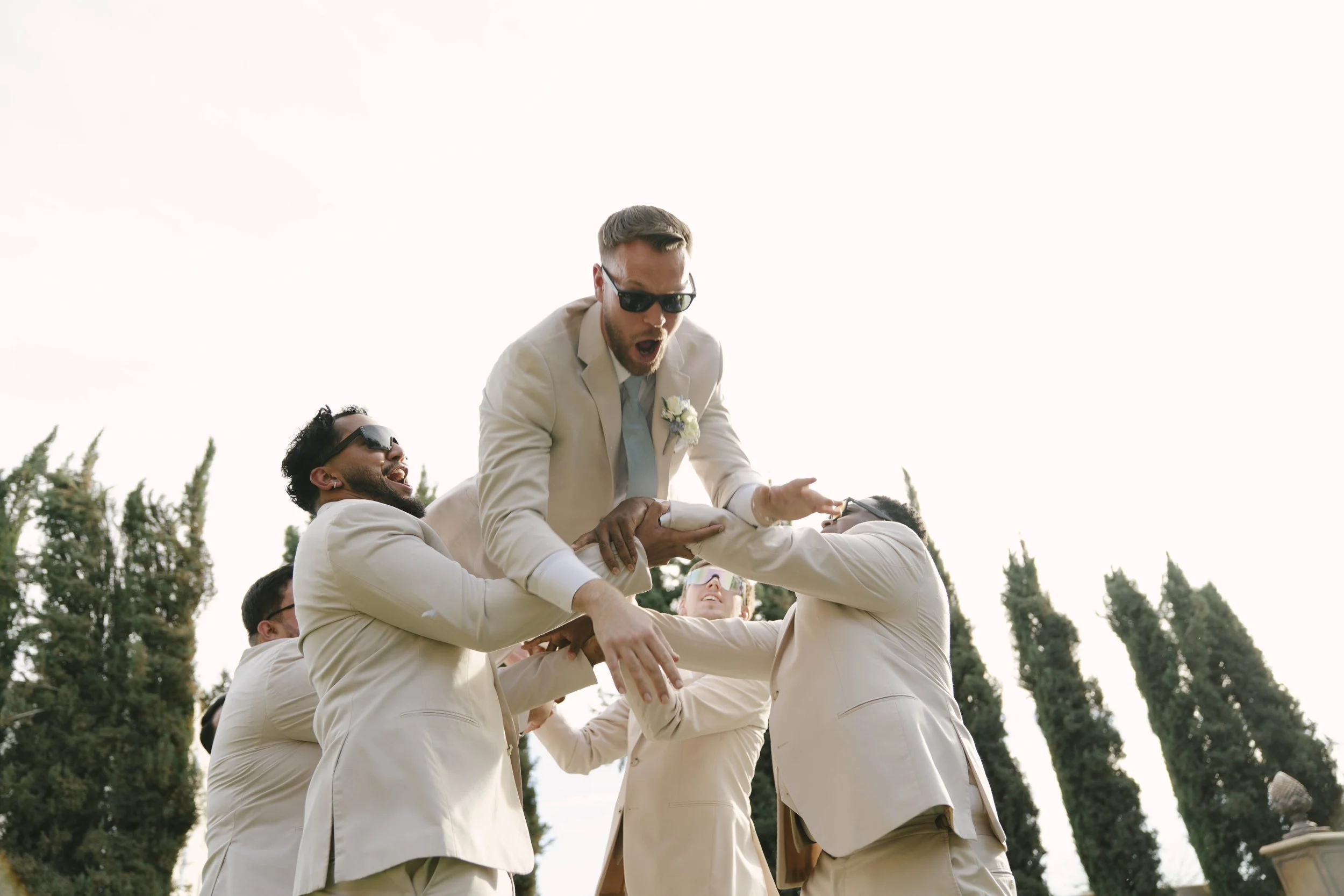 The bridal party portraits at Ashley Castle in Chandler, Arizona, brought playful energy and celebration to the day, with hybrid film and digital photography capturing candid laughter, stylish group moments, and unforgettable memories with the bride,