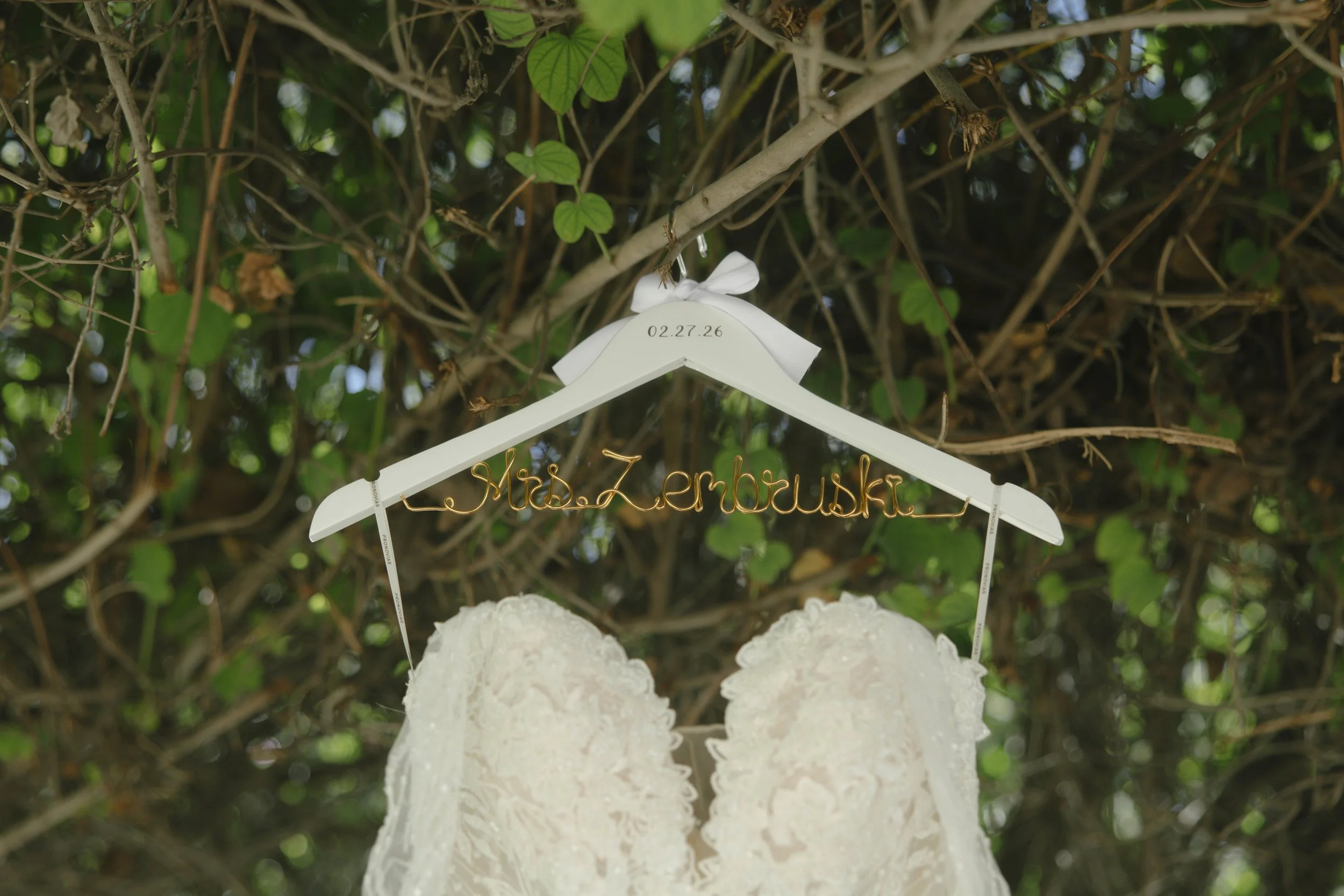 The bride’s getting-ready details at Ashley Castle in Chandler, Arizona, were captured through hybrid film and digital photography, highlighting timeless bridal portraits and elegant gown moments with a romantic, nostalgic feel before the ceremony.