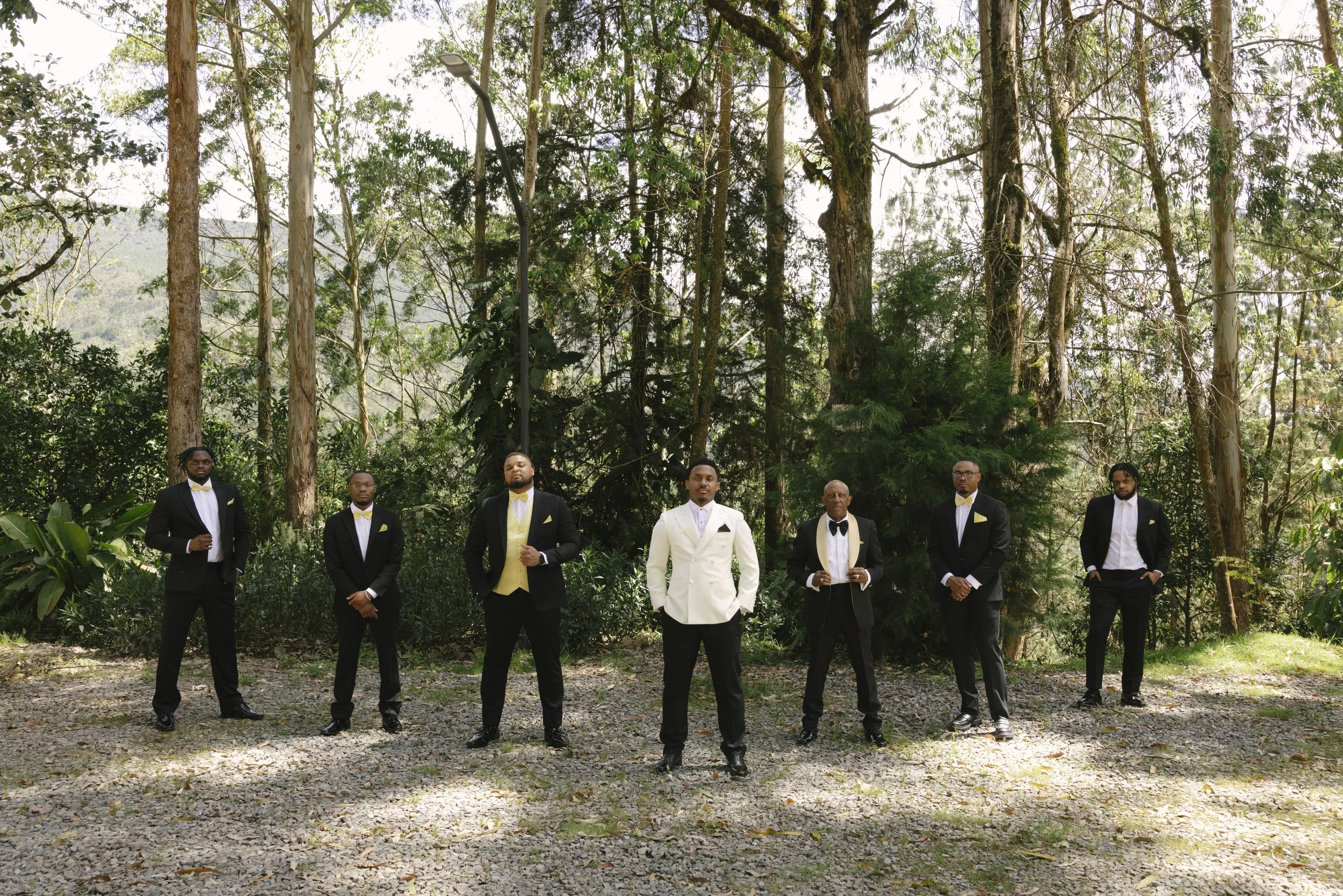 Destination wedding groom portraits at Forest Campestre in Medellín, Colombia featuring modern wedding attire, groomsmen portraits, formal wedding party photos, and documentary wedding photography