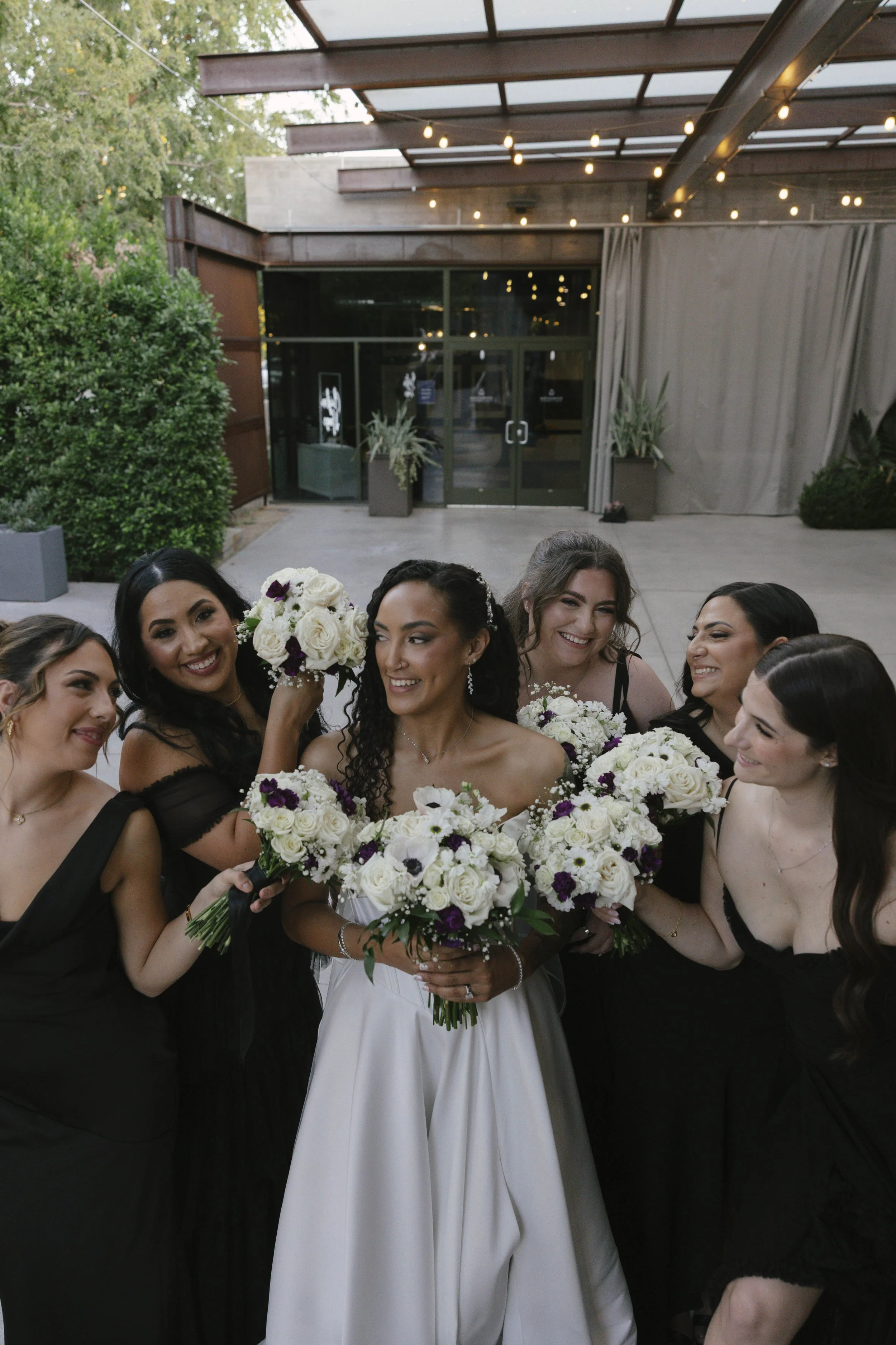 Candid wedding photography from a November celebration at The Clayton House in Scottsdale, Arizona, photographed by Raw By Laura, showcasing real emotion, contemporary architecture, and meaningful moments.