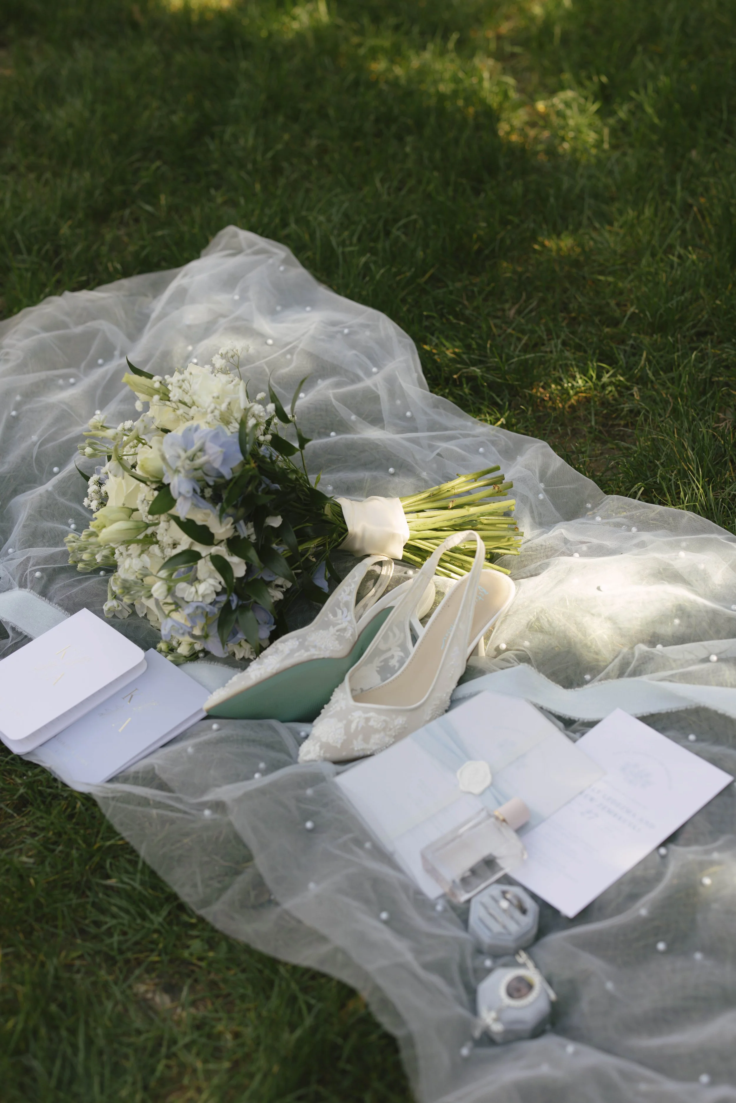 Elegant wedding details from the bride and groom’s Ashley Castle wedding in Chandler, Arizona, featuring romantic ceremony décor, personalized memorial touches, and timeless reception styling at one of Arizona’s premier luxury wedding venues.