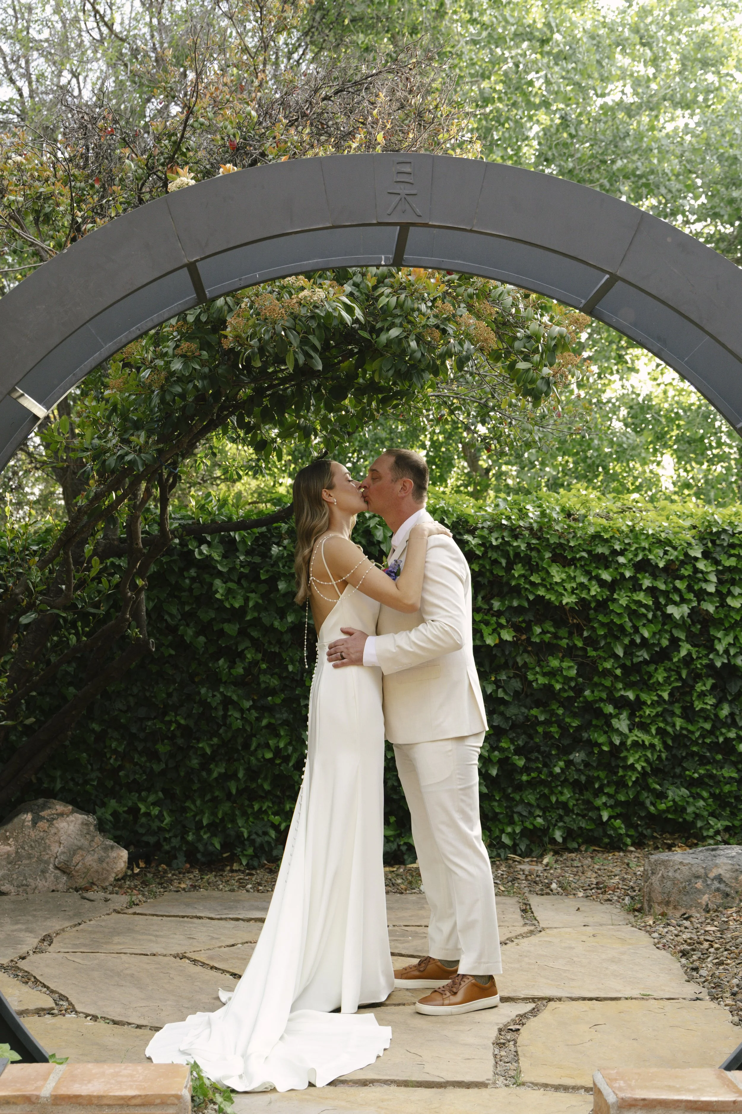 Chelsea and Travis exchanged heartfelt vows during their intimate Sedona elopement at a private Arizona home, surrounded by their closest family, friends, and beloved dog. Their outdoor ceremony was filled with meaningful moments, personal vows, and 