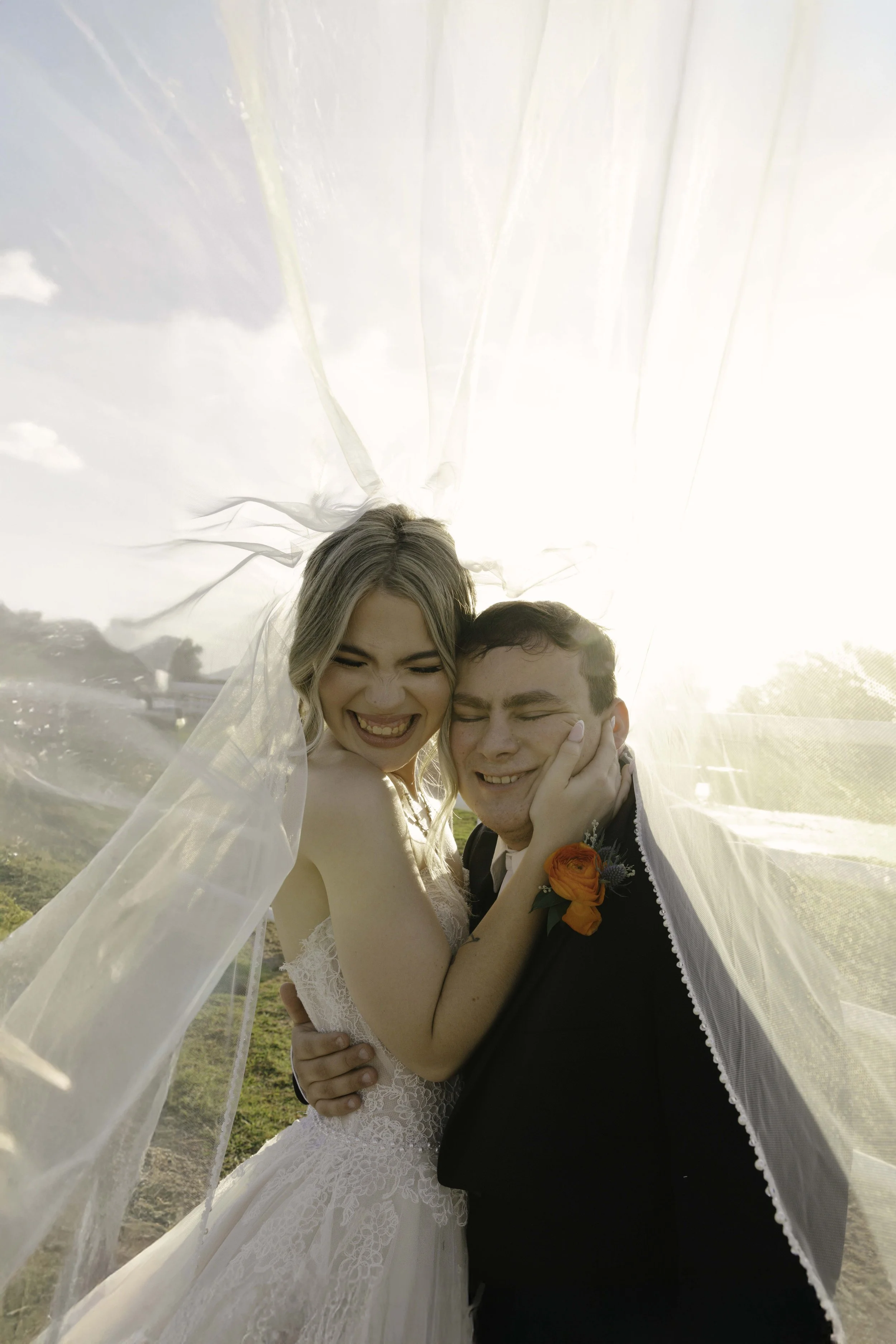 Documentary wedding photography at The Knotty Barn in Queen Creek, Arizona, captured by Arizona wedding photographer Raw By Laura, showcasing authentic moments, desert scenery, and a rustic western wedding setting.