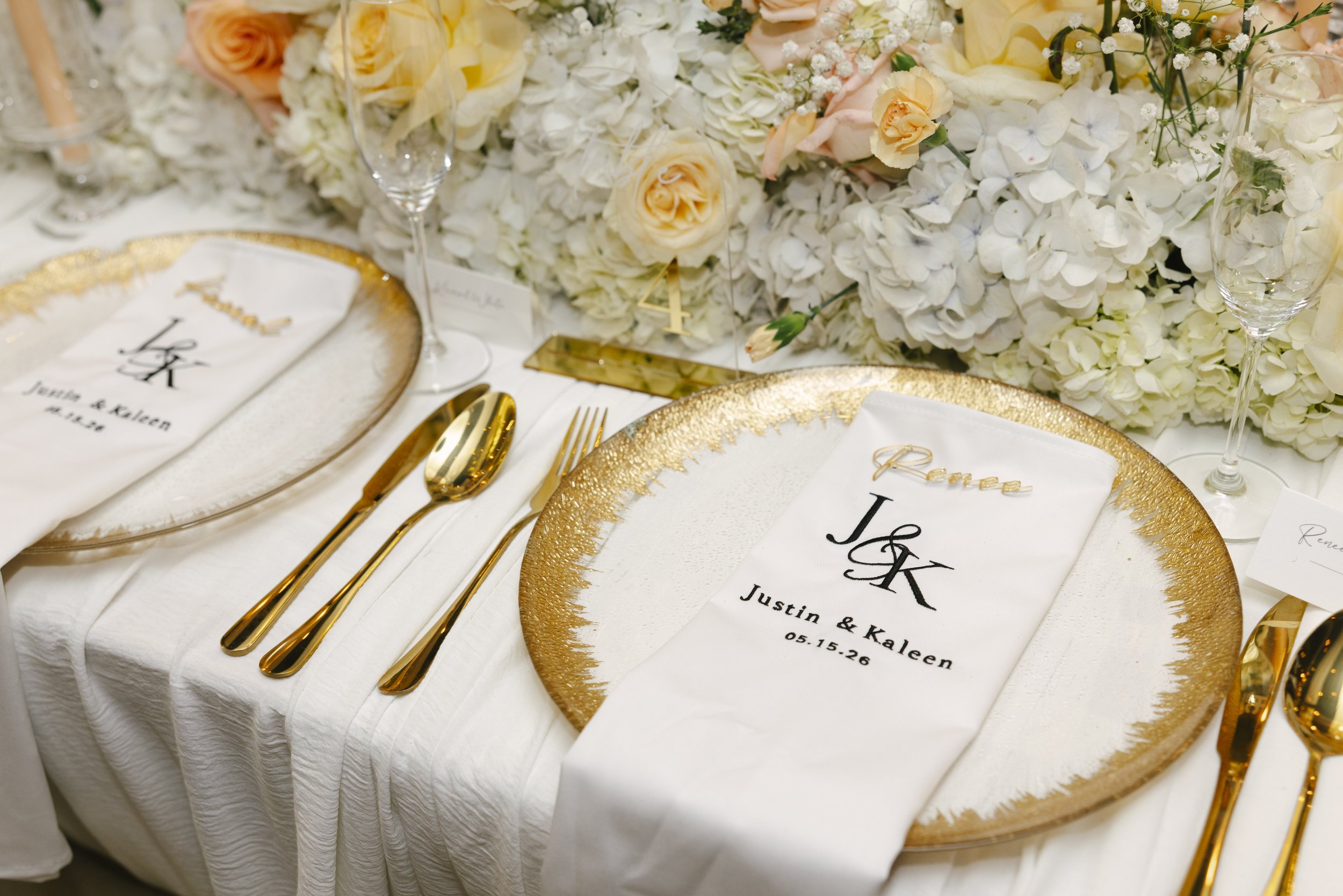 Wedding reception details at Forest Campestre in Medellín, Colombia featuring elegant reception décor, floral tablescapes, wedding cake, custom signage, first dance, and lively celebration captured through documentary wedding photography