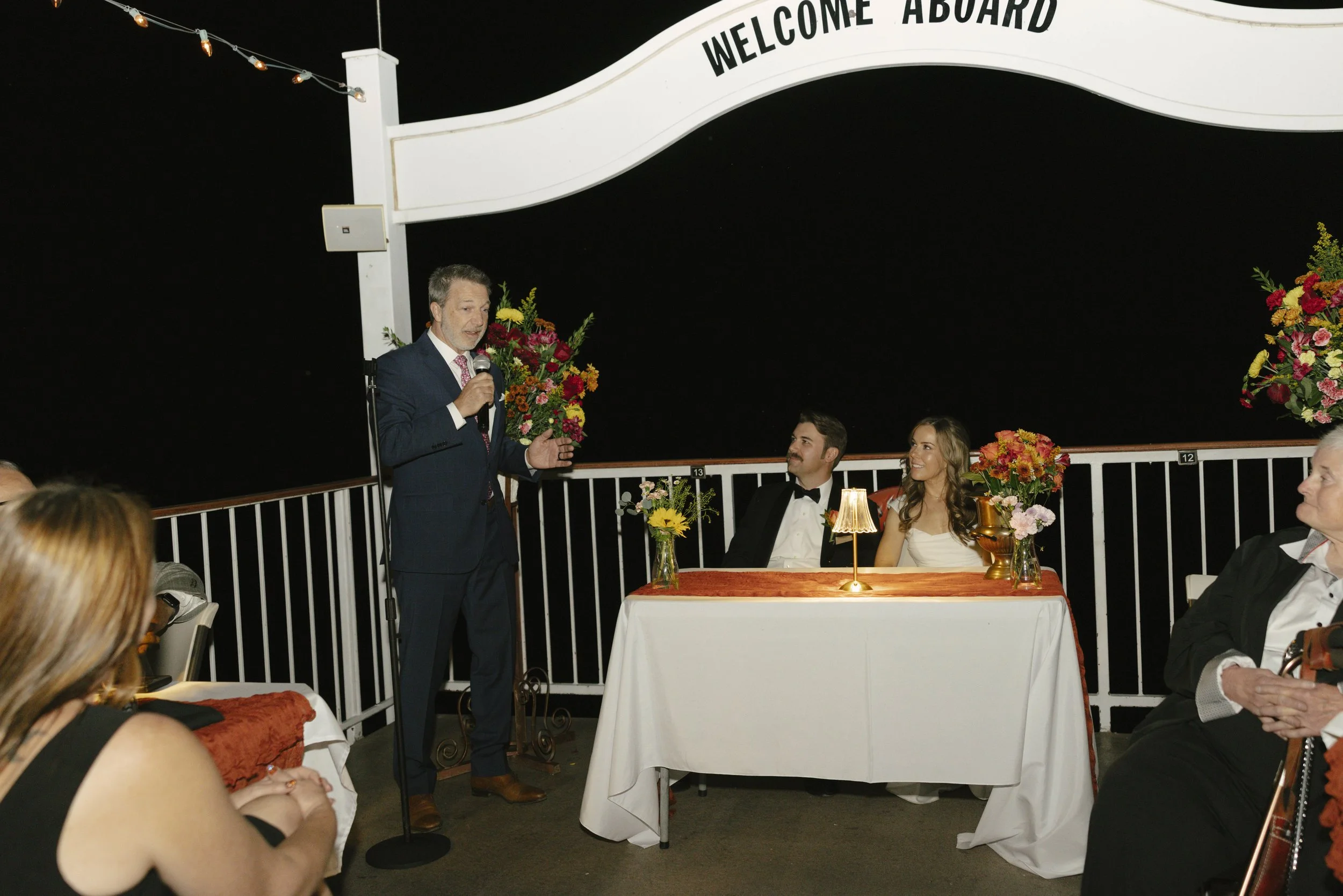 As night fell over Canyon Lake, the celebration continued aboard the Dolly Steamboat with heartfelt toasts, laughter, and time spent with close friends and family. Under the Arizona night sky, the couple shared meaningful moments with their guests, e