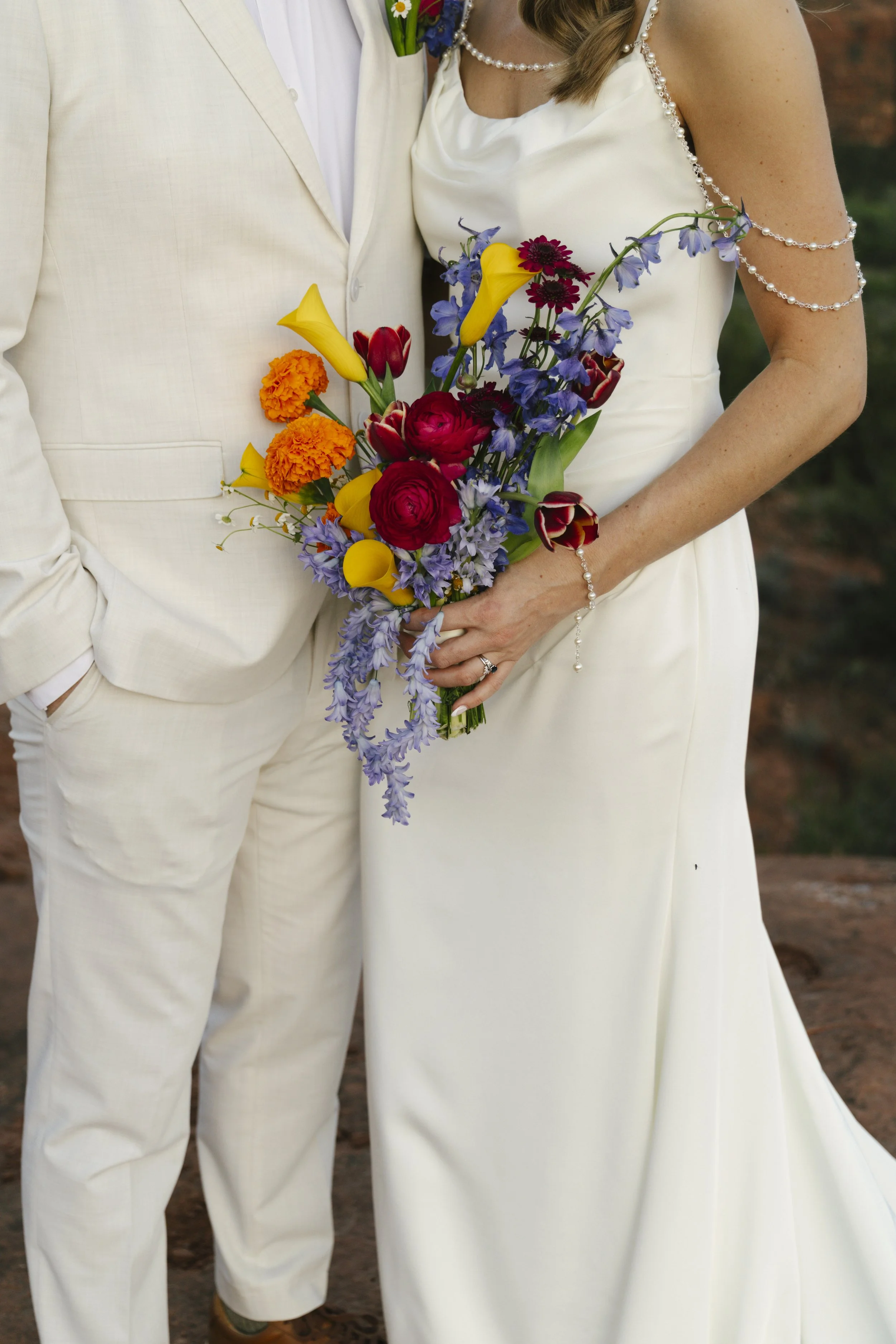 Romantic golden hour portraits at Secret Slick Rock during Chelsea and Travis' intimate Sedona elopement. Featuring Sedona's famous red rock views, stunning Arizona desert landscapes, and timeless wedding photography, these newlywed portraits perfect