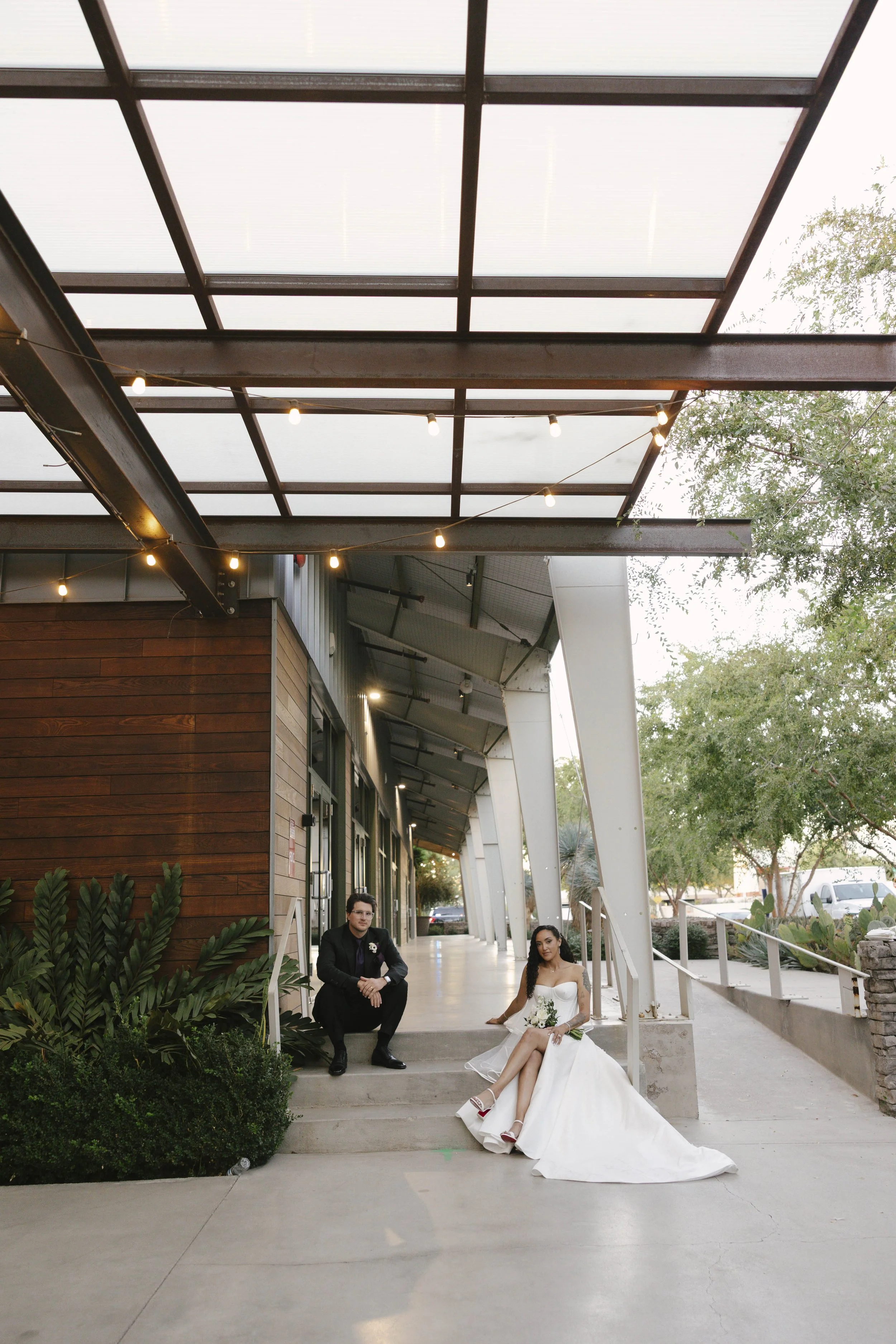 Candid wedding photography from a November celebration at The Clayton House in Scottsdale, Arizona, photographed by Raw By Laura, showcasing real emotion, contemporary architecture, and meaningful moments.