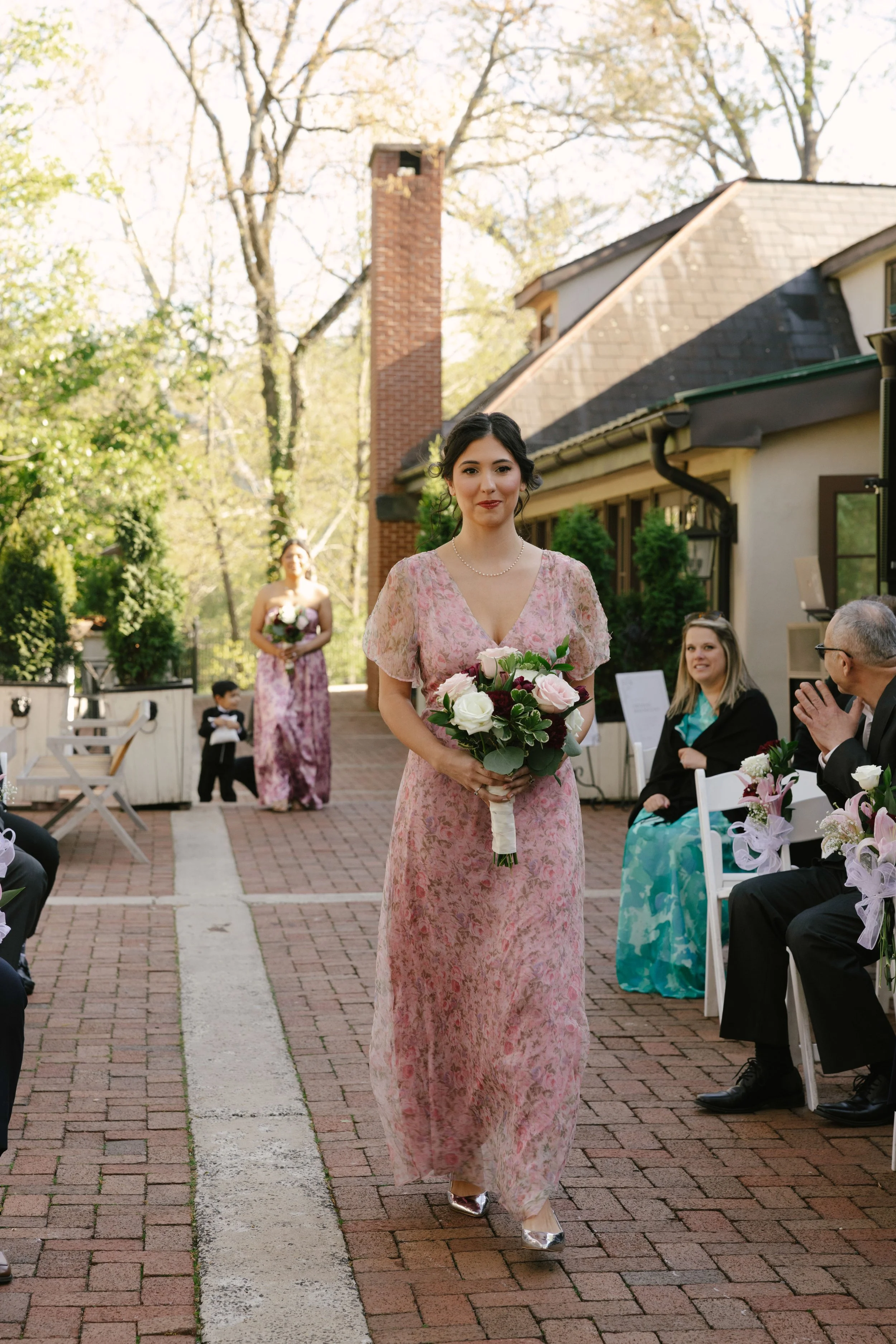 Outdoor wedding ceremony at Hotel DuVillage featuring the bride and groom, wedding party, and meaningful moments captured on both digital and 35mm film. A timeless celebration documented with a candid, documentary approach