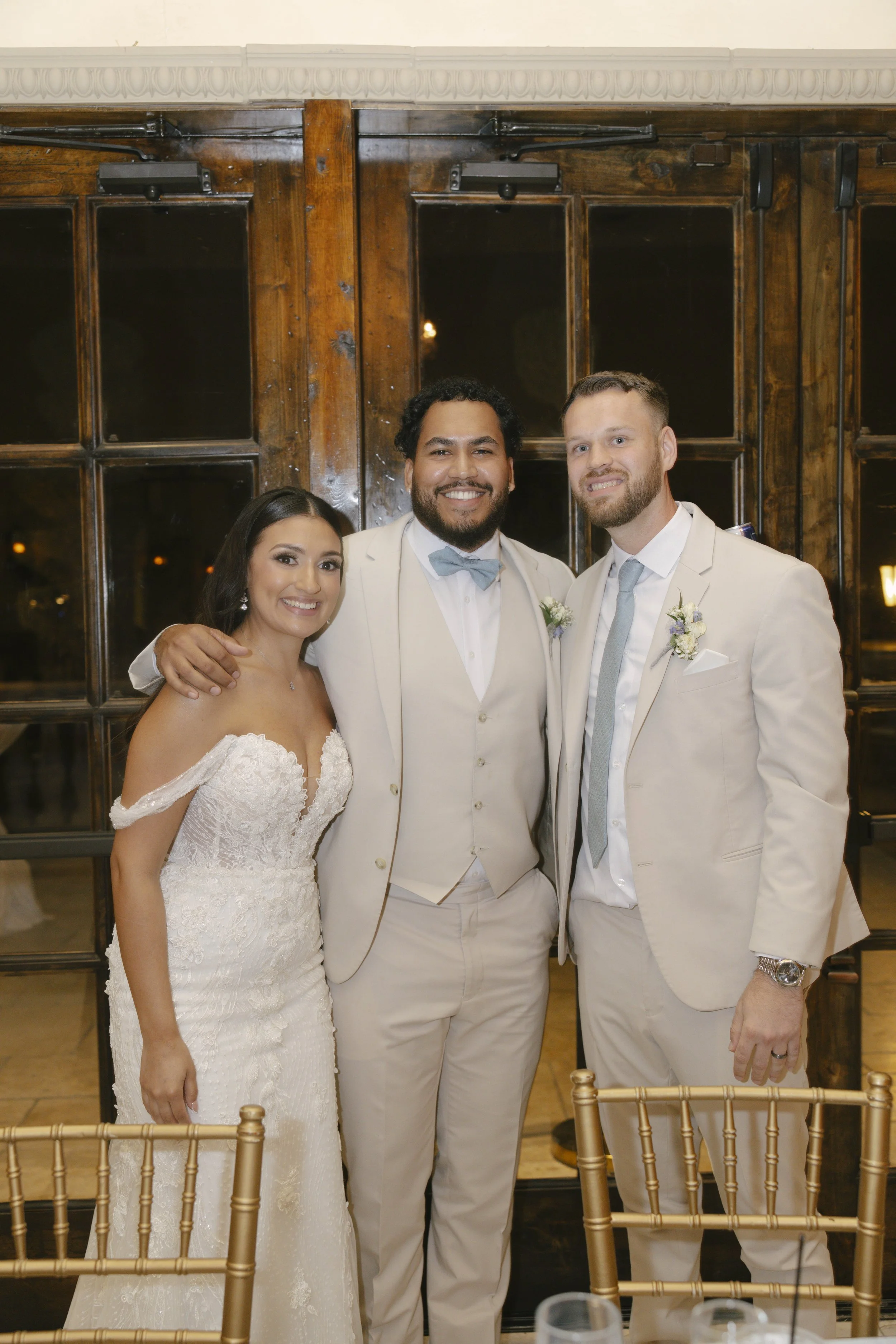 The reception celebration at Ashley Castle in Chandler, Arizona, came to life through hybrid film and digital photography, capturing elegant reception details, joyful bridal party entrances, and lively dance floor moments inside the castle’s grand ba