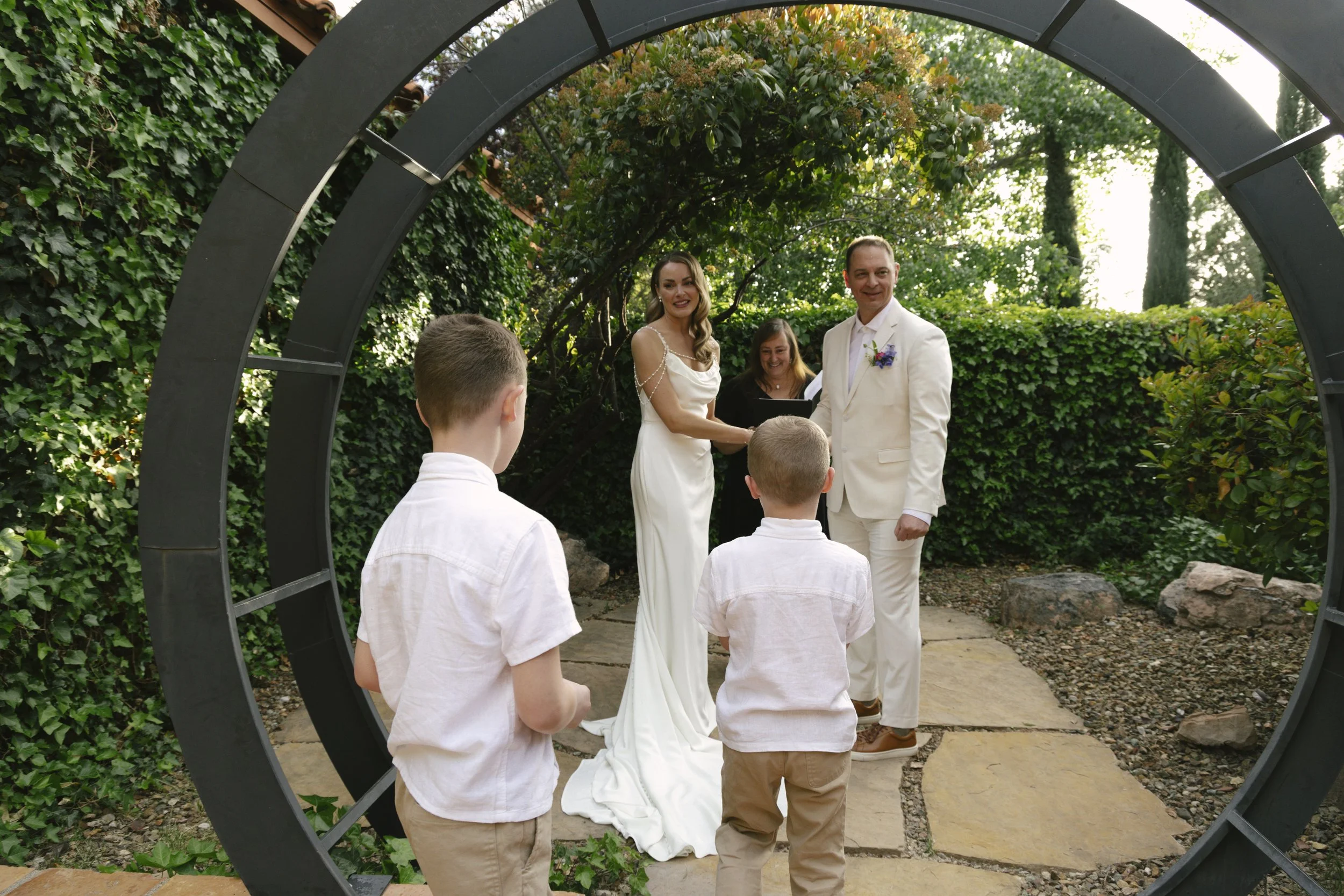 Chelsea and Travis exchanged heartfelt vows during their intimate Sedona elopement at a private Arizona home, surrounded by their closest family, friends, and beloved dog. Their outdoor ceremony was filled with meaningful moments, personal vows, and 