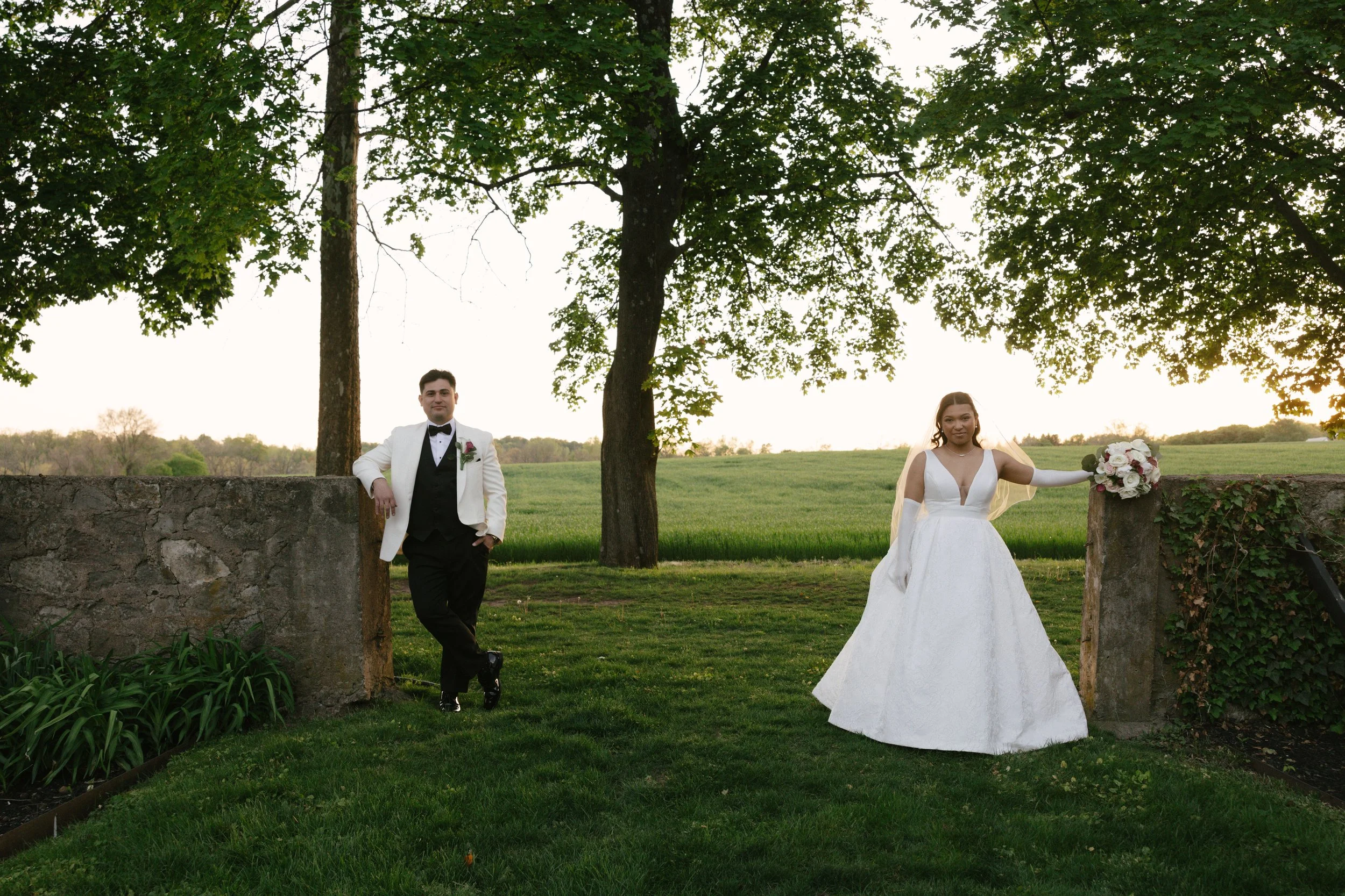 As the sun began to set, the bride and groom stepped away for golden hour portraits around the grounds of Hotel DuVillage. Captured on both digital and 35mm film, these sunset portraits highlight the warmth, romance, and quiet moments shared between 