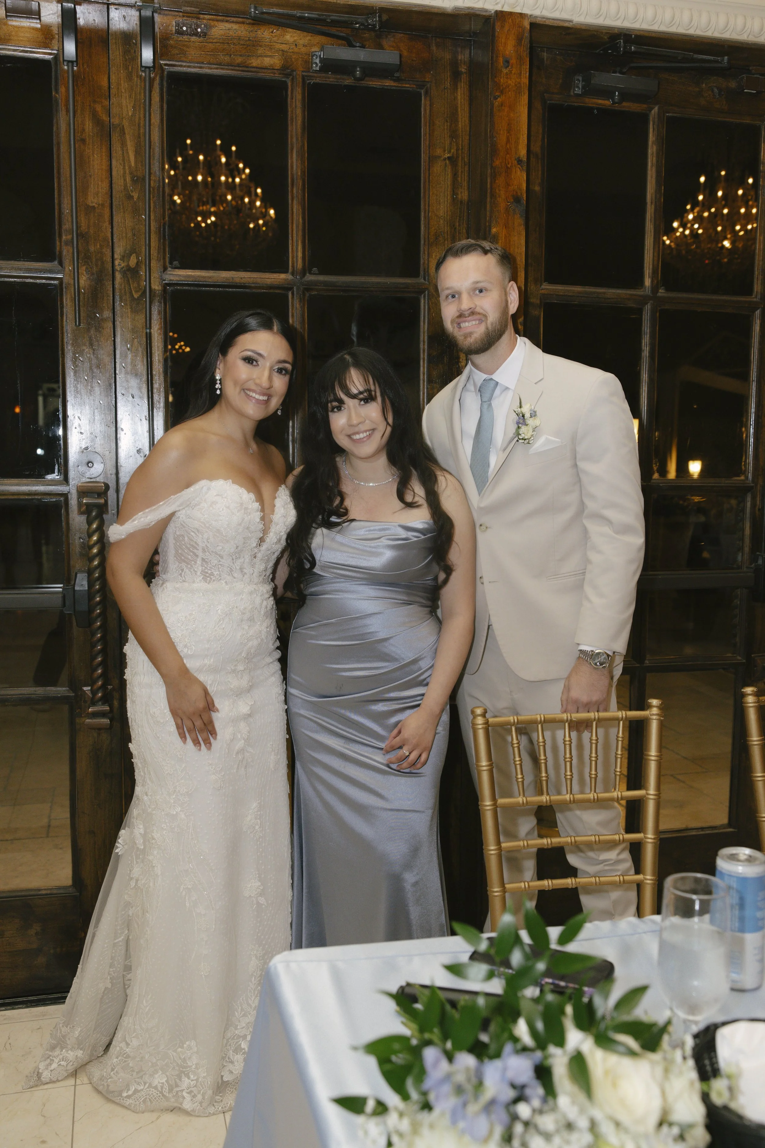 The reception celebration at Ashley Castle in Chandler, Arizona, came to life through hybrid film and digital photography, capturing elegant reception details, joyful bridal party entrances, and lively dance floor moments inside the castle’s grand ba