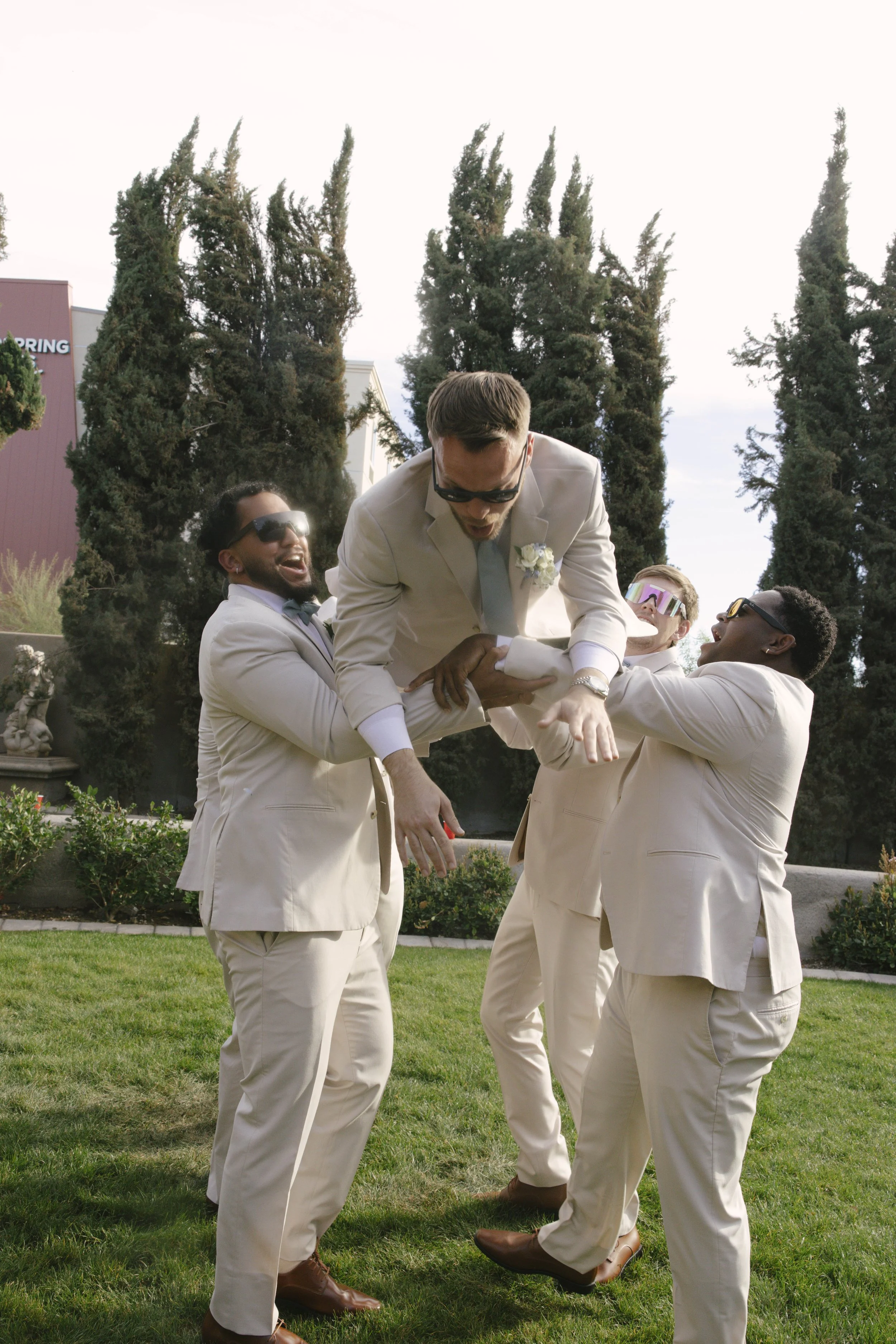 The bridal party portraits at Ashley Castle in Chandler, Arizona, brought playful energy and celebration to the day, with hybrid film and digital photography capturing candid laughter, stylish group moments, and unforgettable memories with the bride,