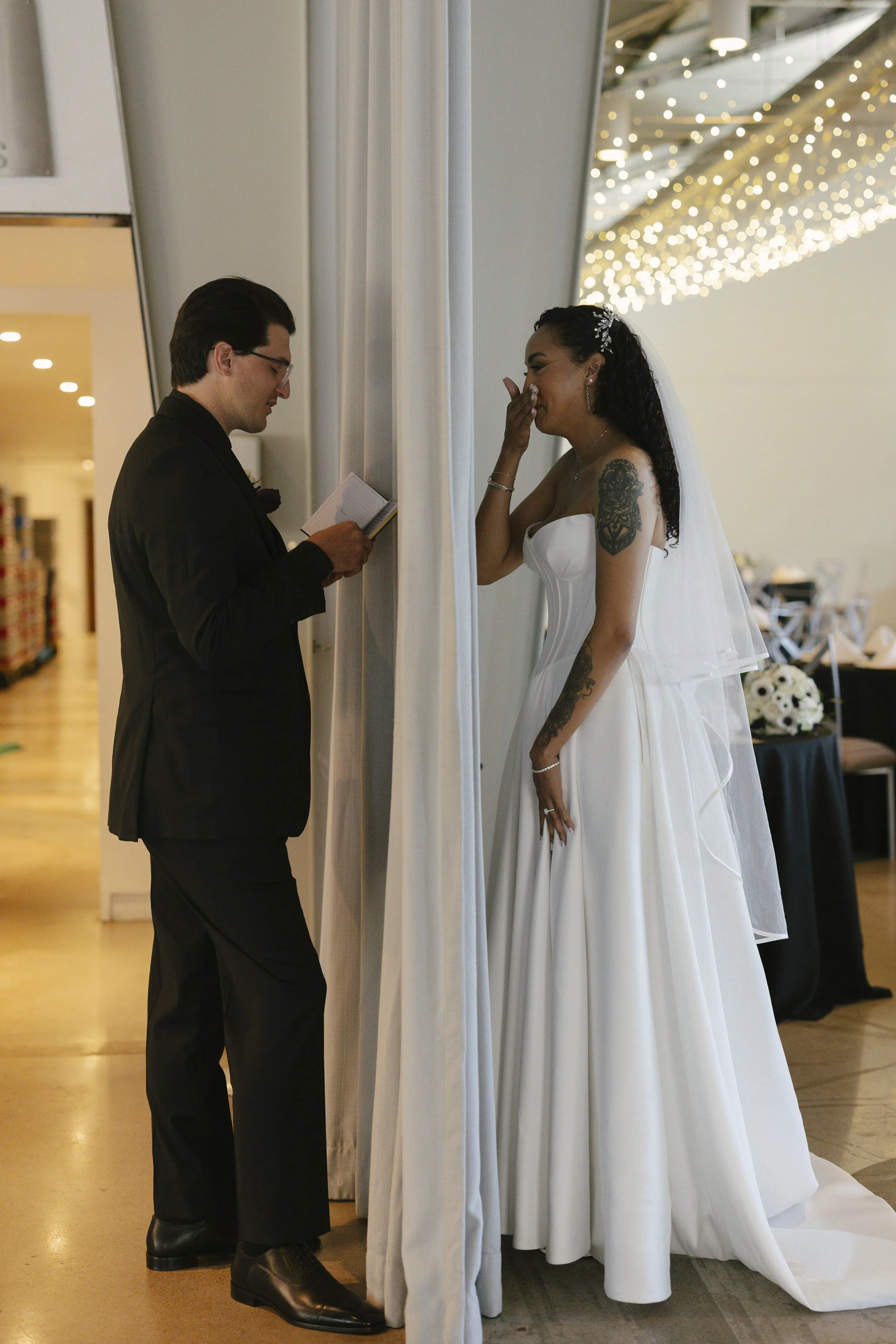 Candid wedding photography from a November celebration at The Clayton House in Scottsdale, Arizona, photographed by Raw By Laura, showcasing real emotion, contemporary architecture, and meaningful moments.