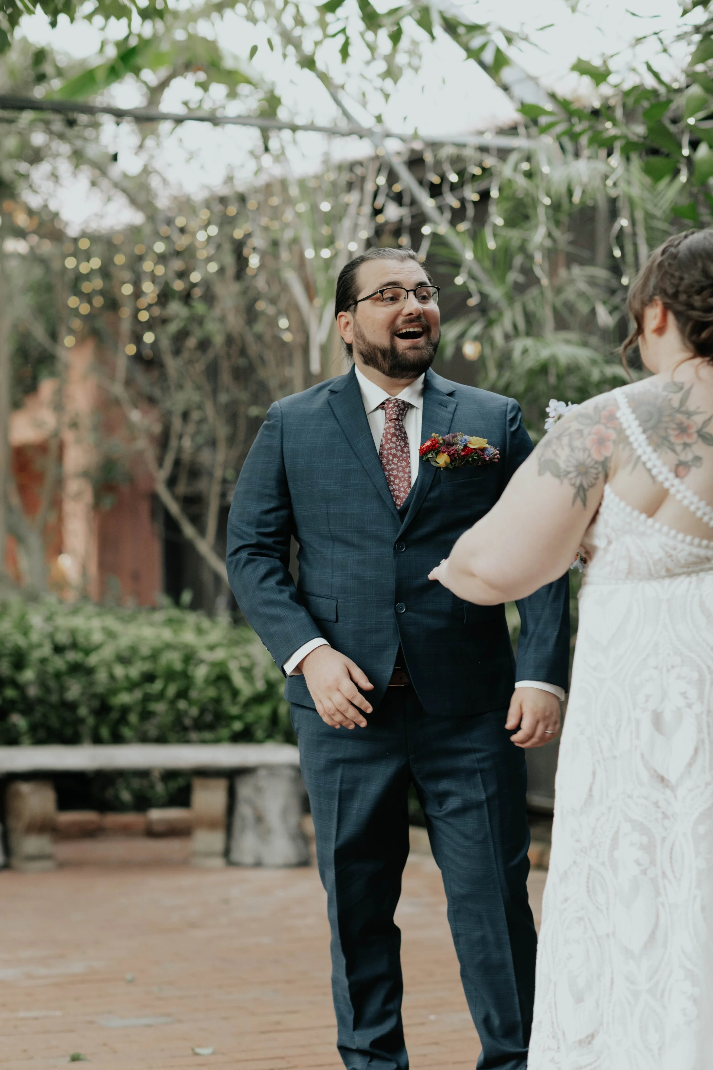 Before the ceremony, Lauren and Joel shared a joyful first look surrounded by the lush greenery of the Boojum Tree in Phoenix. These quiet moments together allowed them to take in the excitement of the day while capturing relaxed portraits before cel