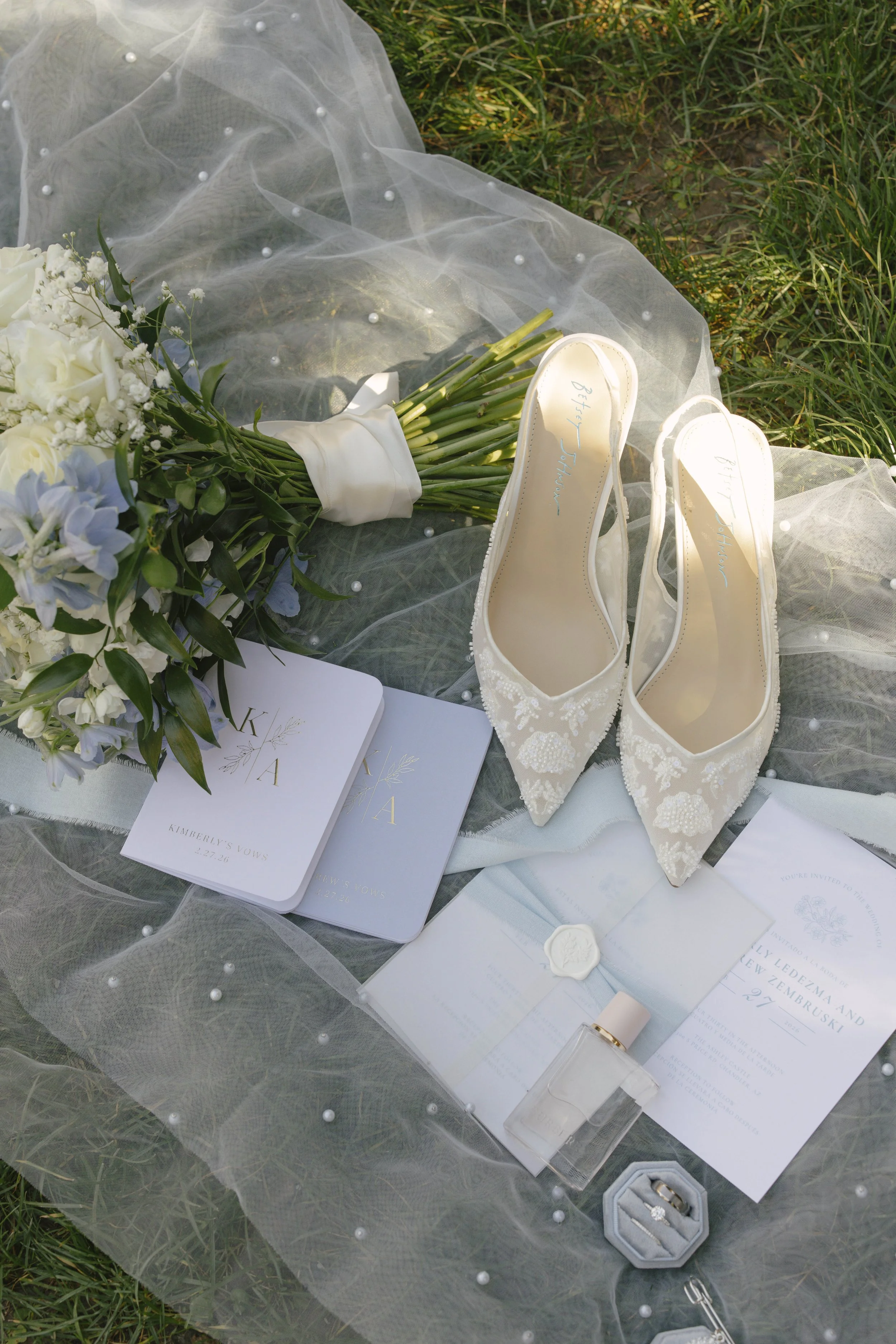 Elegant wedding details from the bride and groom’s Ashley Castle wedding in Chandler, Arizona, featuring romantic ceremony décor, personalized memorial touches, and timeless reception styling at one of Arizona’s premier luxury wedding venues.