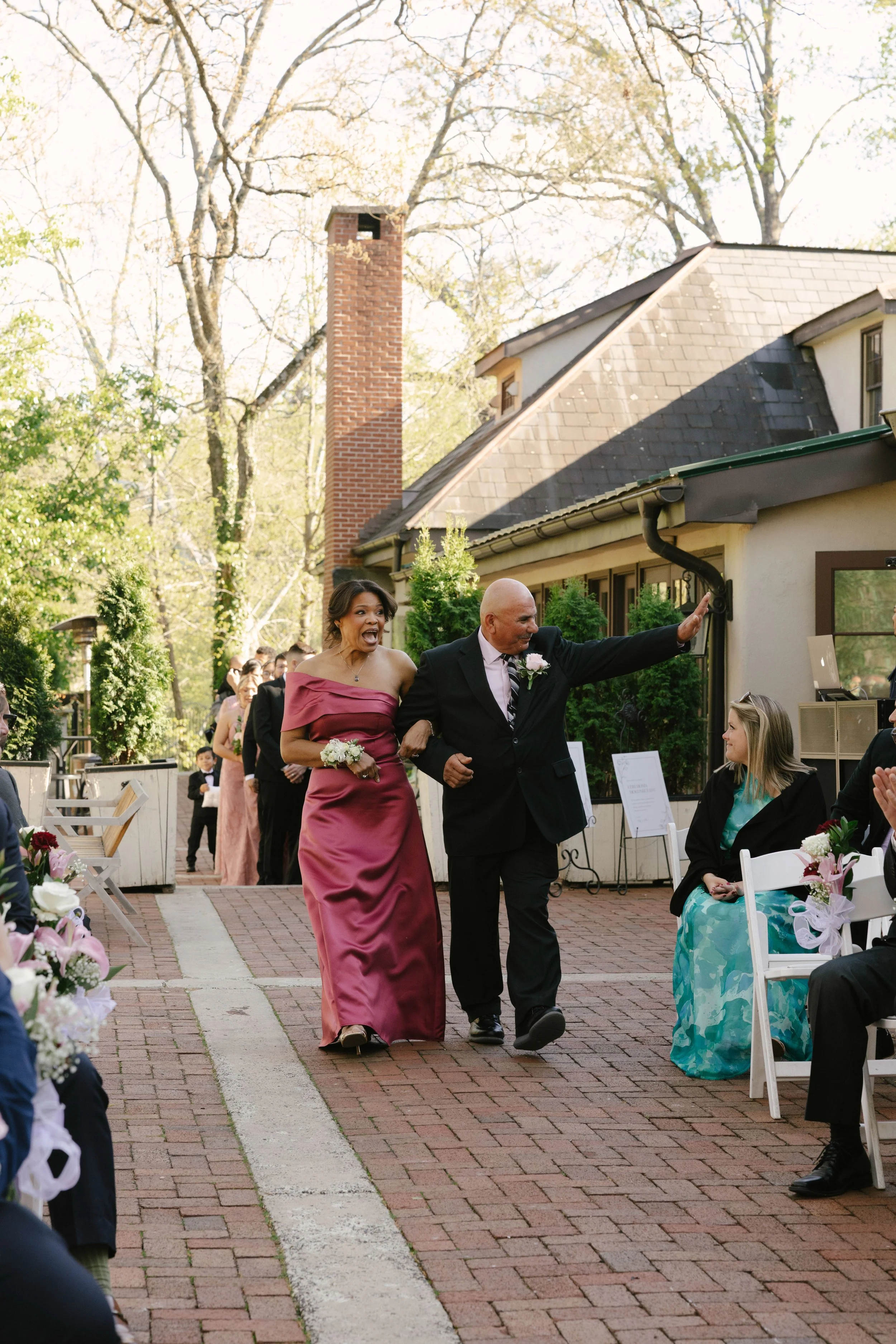 Outdoor wedding ceremony at Hotel DuVillage featuring the bride and groom, wedding party, and meaningful moments captured on both digital and 35mm film. A timeless celebration documented with a candid, documentary approach