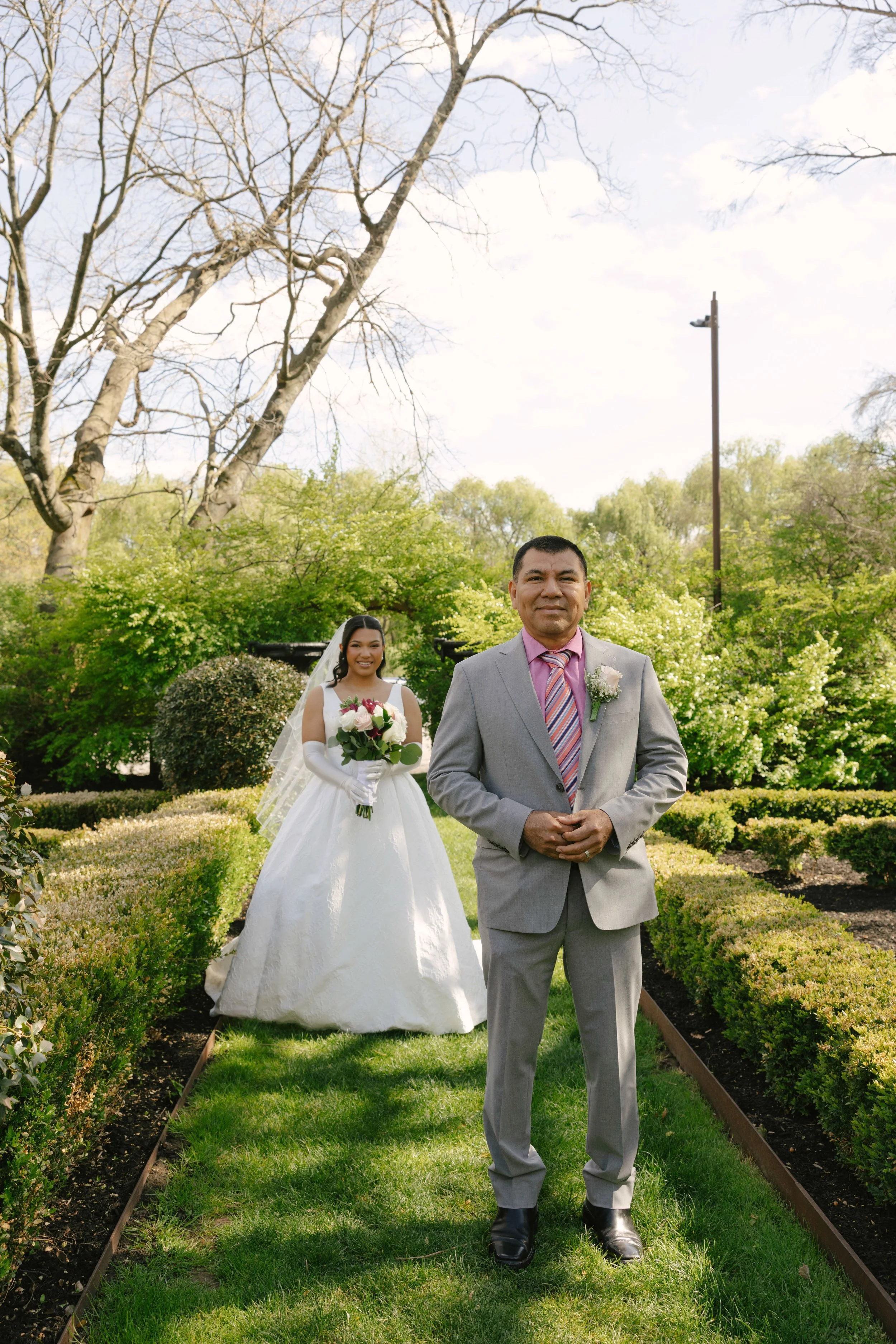 A heartfelt first look between the bride and her father, followed by an emotional first look between the bride and groom at Hotel DuVillage. Captured on both digital and 35mm film, these quiet moments before the ceremony reflect the anticipation, emo