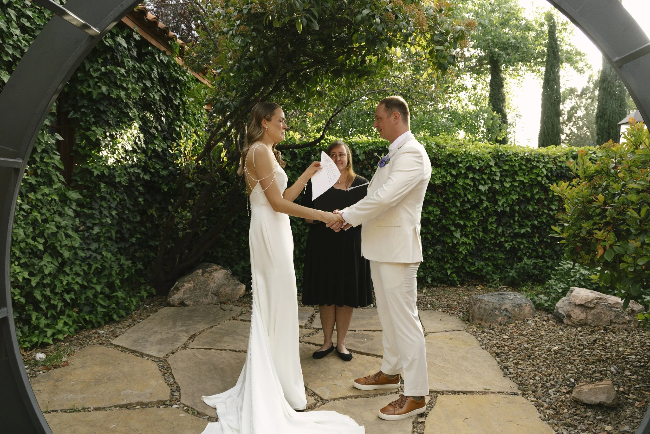Chelsea and Travis exchanged heartfelt vows during their intimate Sedona elopement at a private Arizona home, surrounded by their closest family, friends, and beloved dog. Their outdoor ceremony was filled with meaningful moments, personal vows, and 