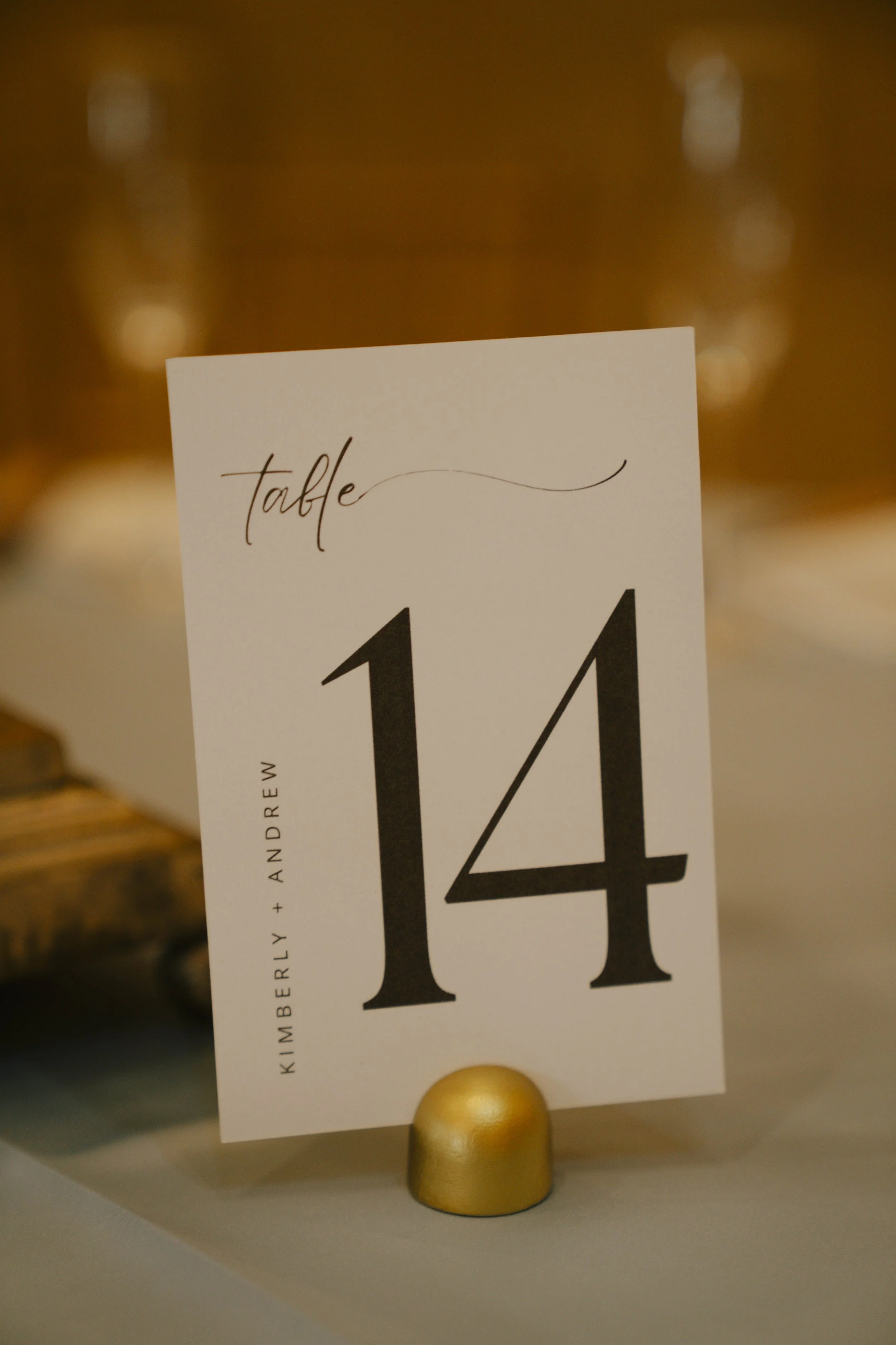 Ceremony details at Ashley Castle in Chandler, Arizona, were thoughtfully captured through hybrid film and digital photography, highlighting elegant signage, romantic seating displays, and the bridesmaid processional as guests gathered for this timel