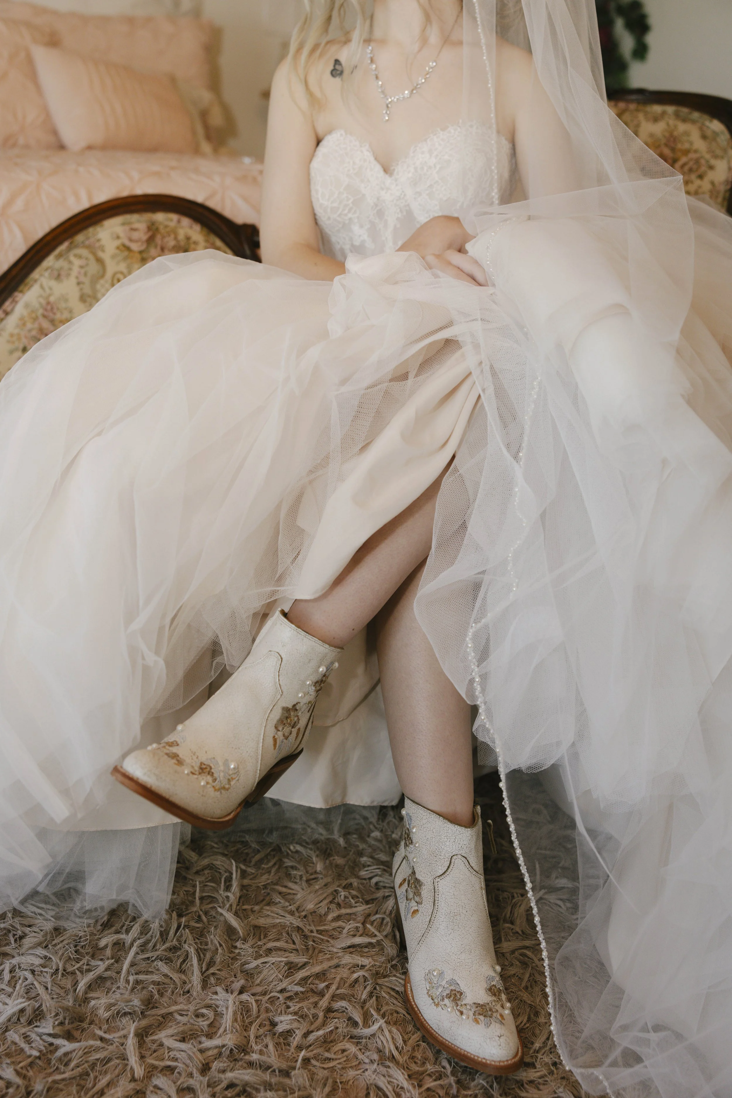 Candid wedding photography from a December wedding at The Knotty Barn in Queen Creek, Arizona, photographed by Raw By Laura, highlighting natural emotion, rustic details, and warm desert tones.