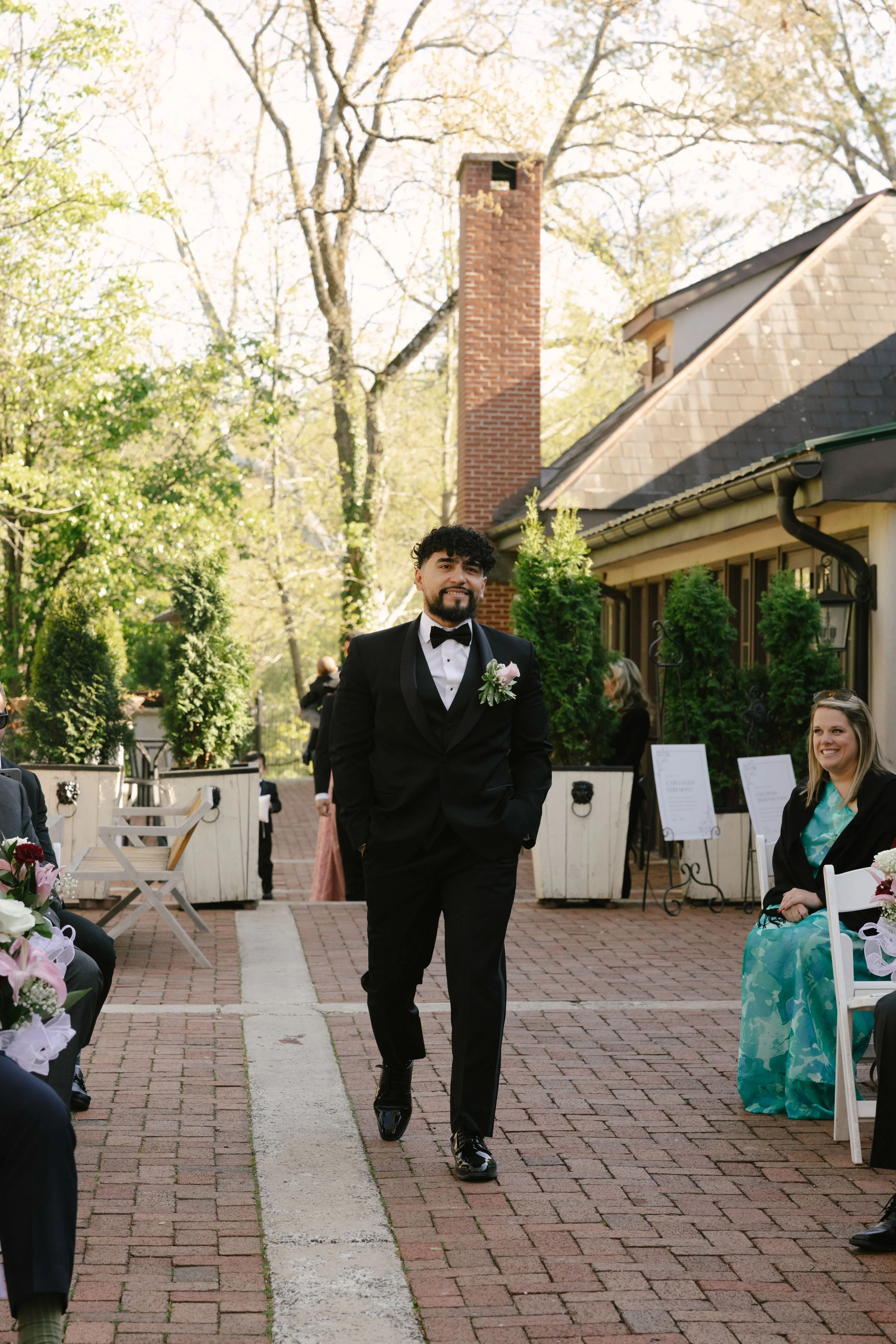 Outdoor wedding ceremony at Hotel DuVillage featuring the bride and groom, wedding party, and meaningful moments captured on both digital and 35mm film. A timeless celebration documented with a candid, documentary approach
