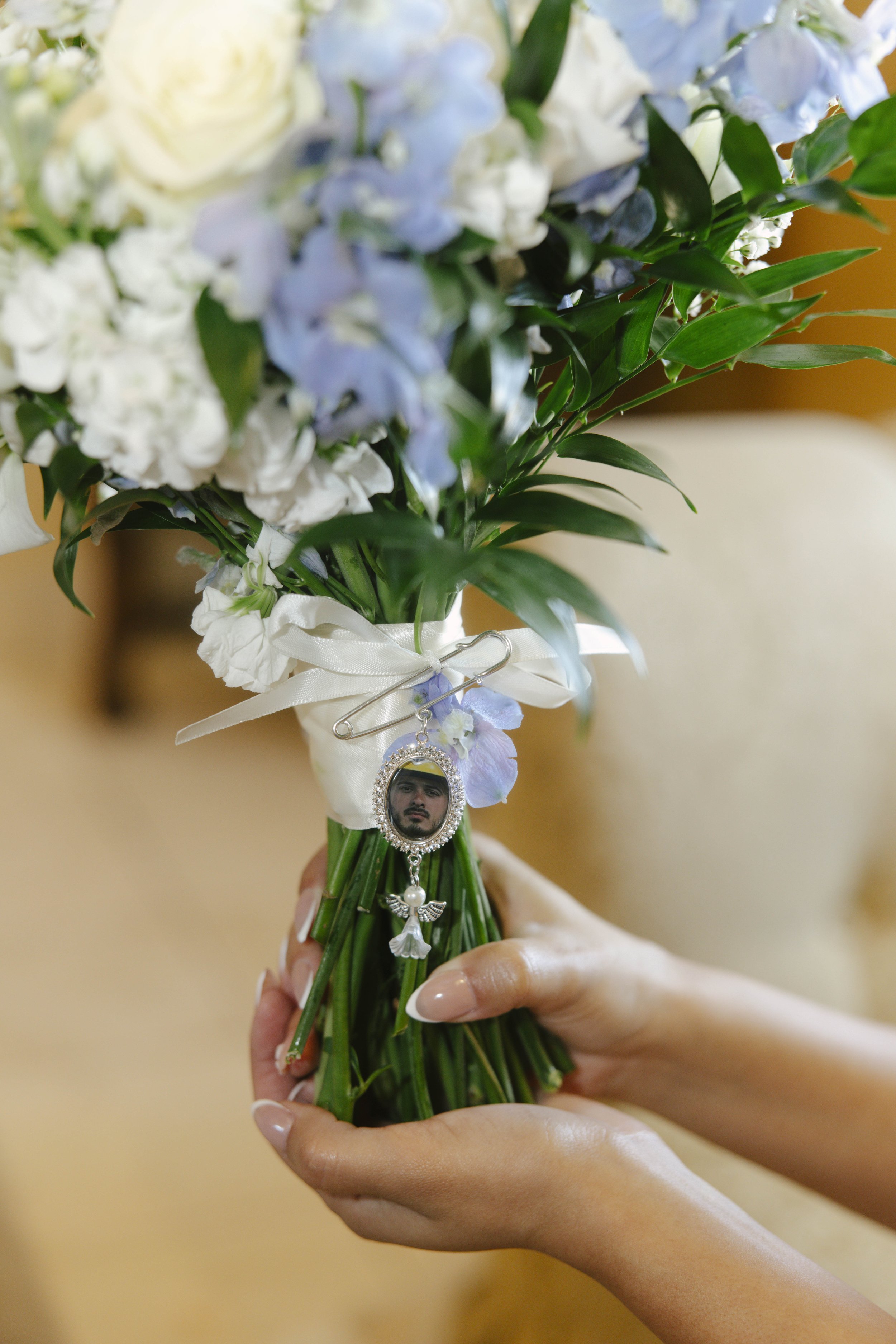 The bride shared joyful getting-ready moments with her bridal party inside Ashley Castle in Chandler, Arizona, where laughter, champagne toasts, and final floral touches were captured through hybrid film and digital photography for a timeless and hea