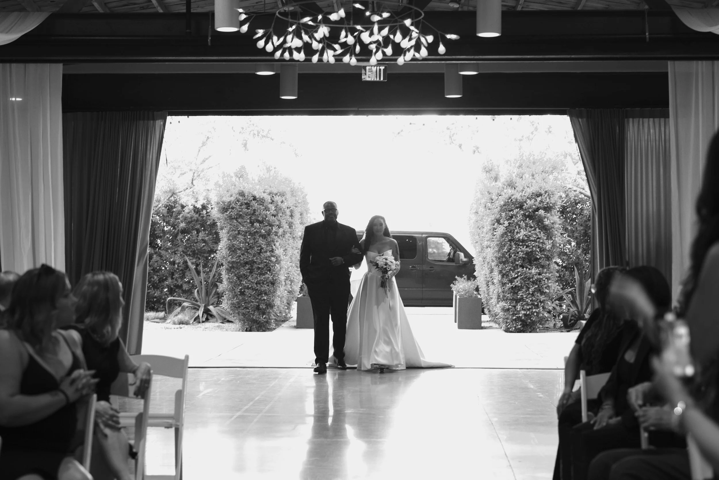 Candid wedding photography from a November celebration at The Clayton House in Scottsdale, Arizona, photographed by Raw By Laura, showcasing real emotion, contemporary architecture, and meaningful moments.